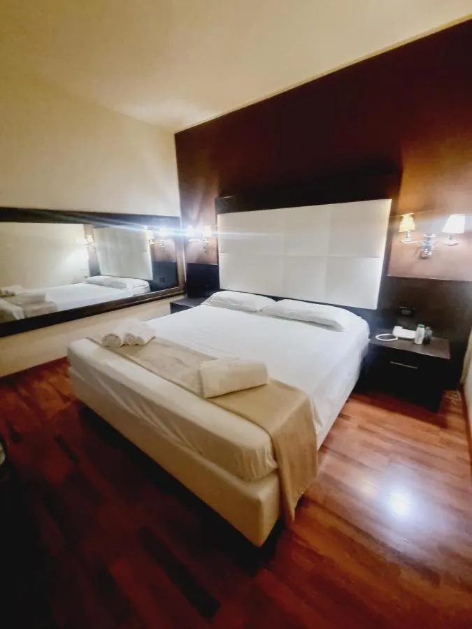 Bedroom, Bed in Momi's Hotel