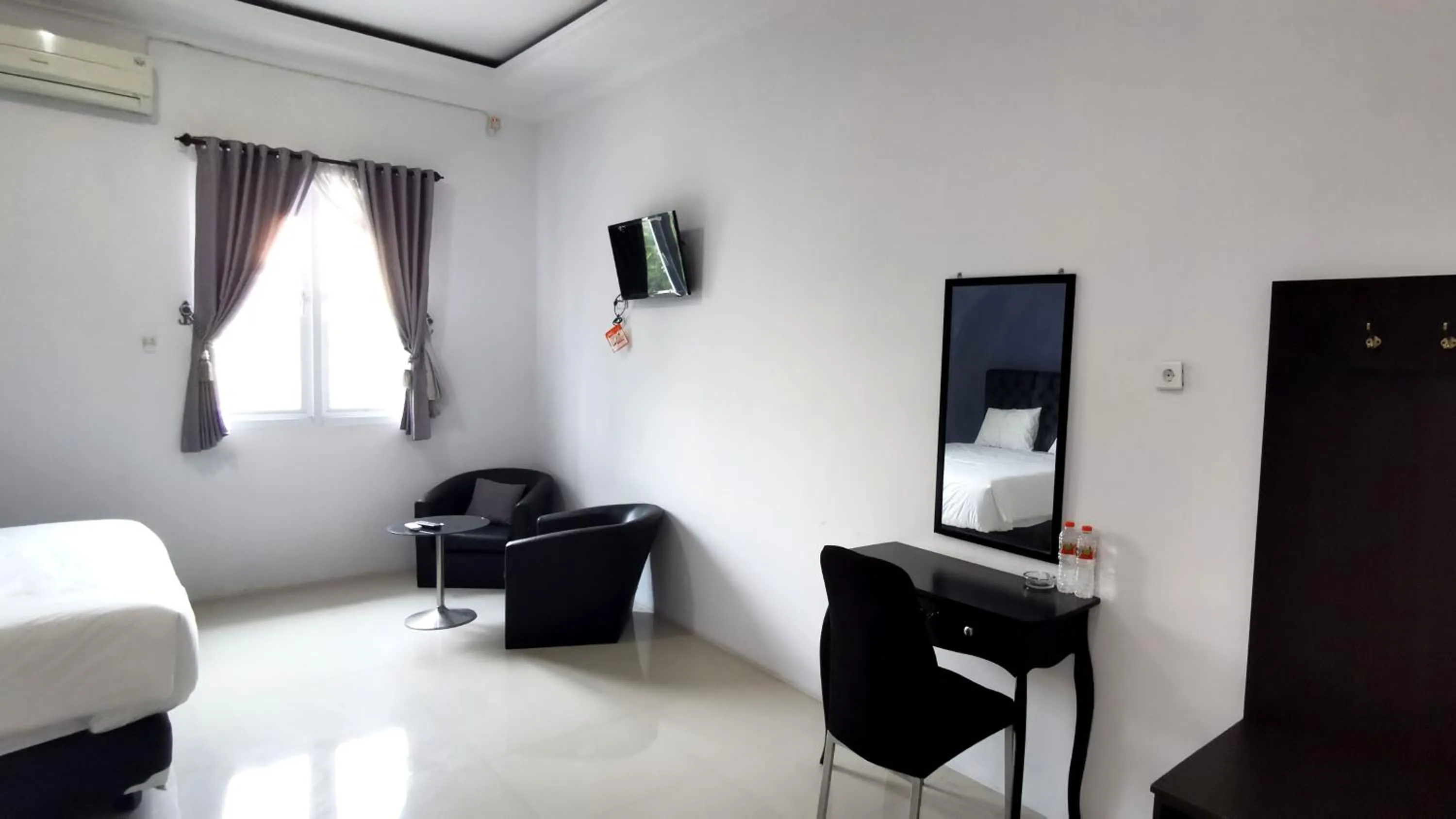 TV and multimedia in Hotel Aqiilah Syariah