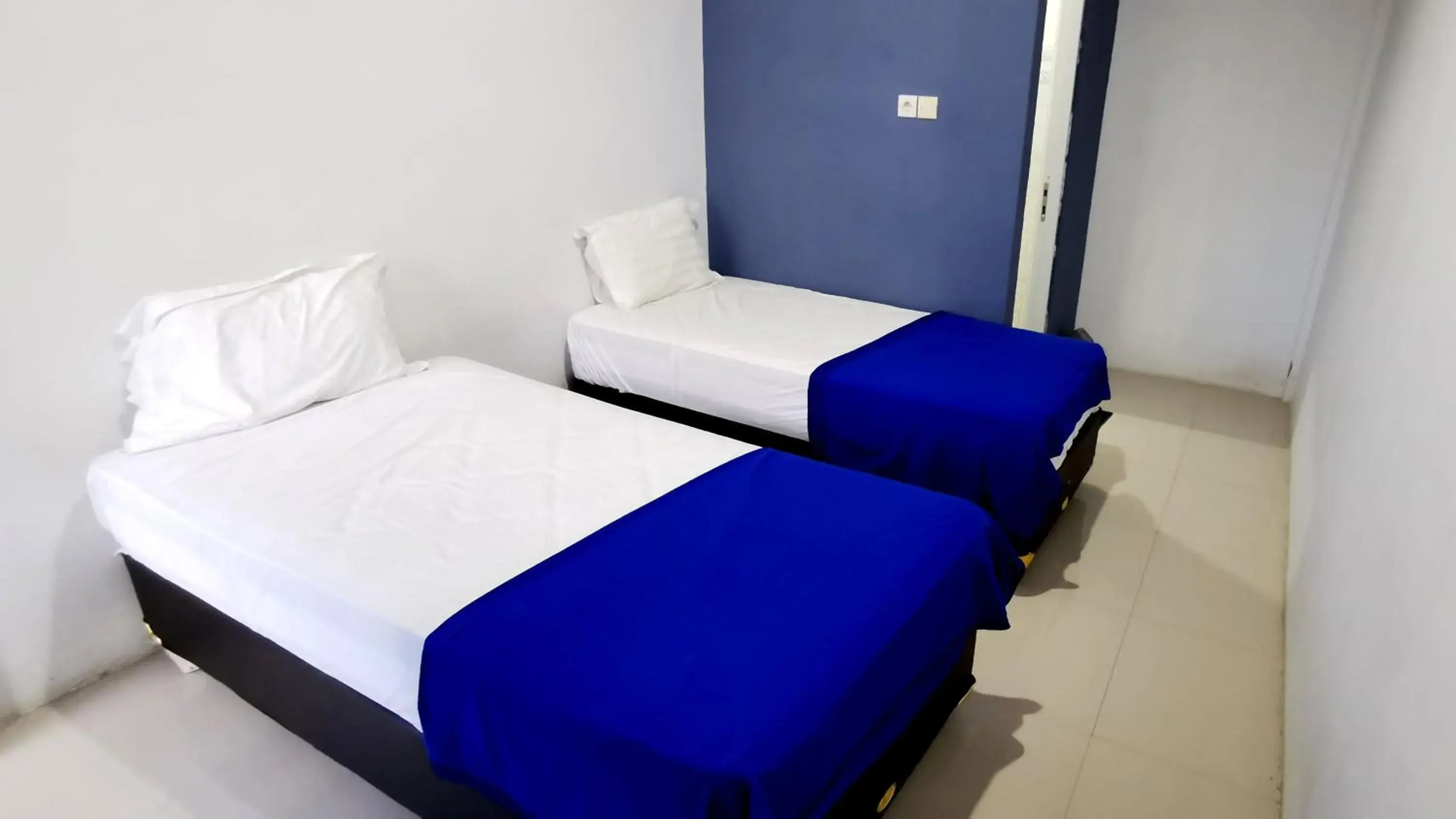 Bed in Hotel Aqiilah Syariah Bed in Hotel Aqiilah Syariah