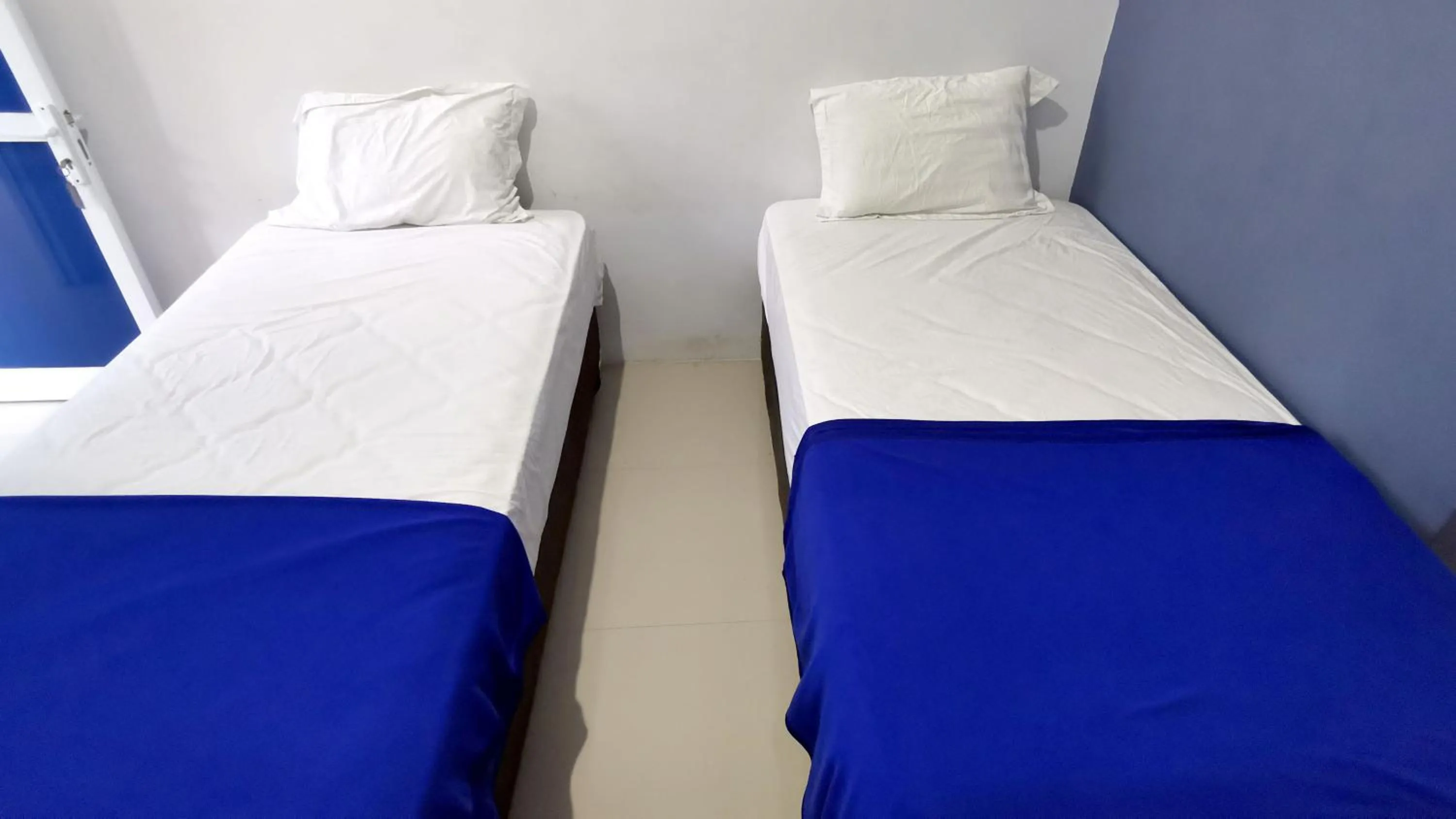 Bed in Hotel Aqiilah Syariah