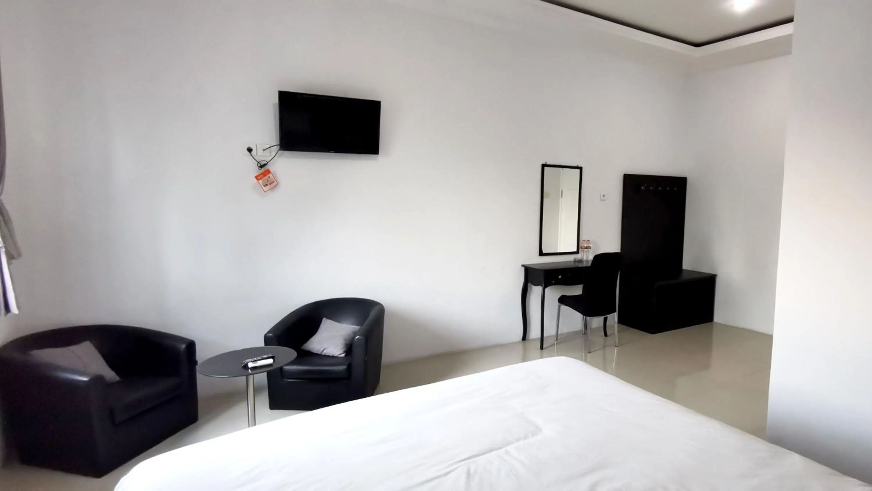 TV and multimedia in Hotel Aqiilah Syariah