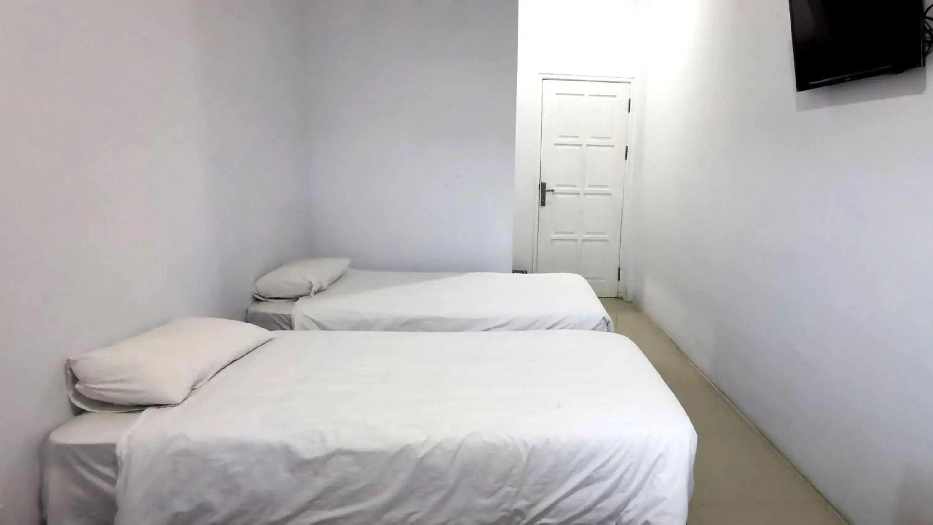 Bed in Hotel Aqiilah Syariah Bed in Hotel Aqiilah Syariah