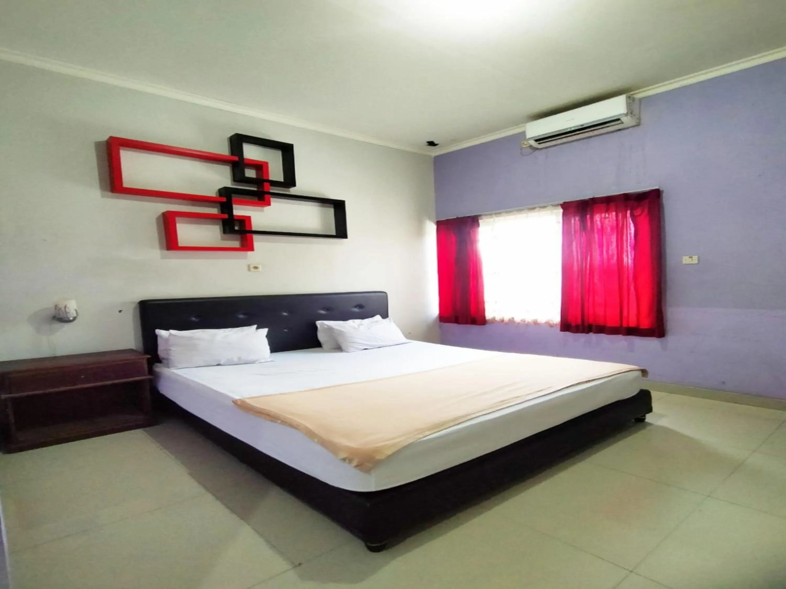 Bed in RedDoorz at Hotel Nuansa Ngawi