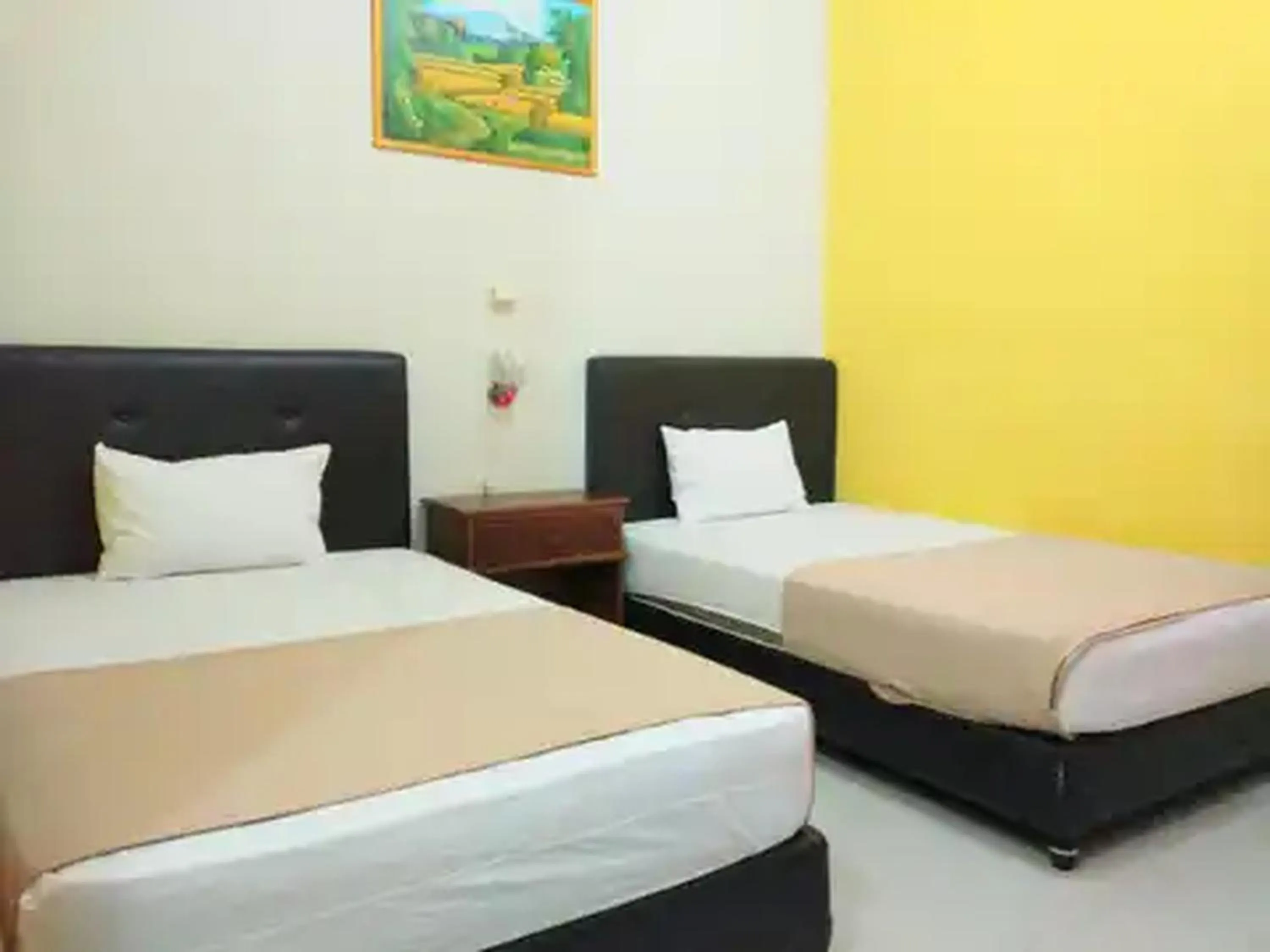 Bed in RedDoorz at Hotel Nuansa Ngawi