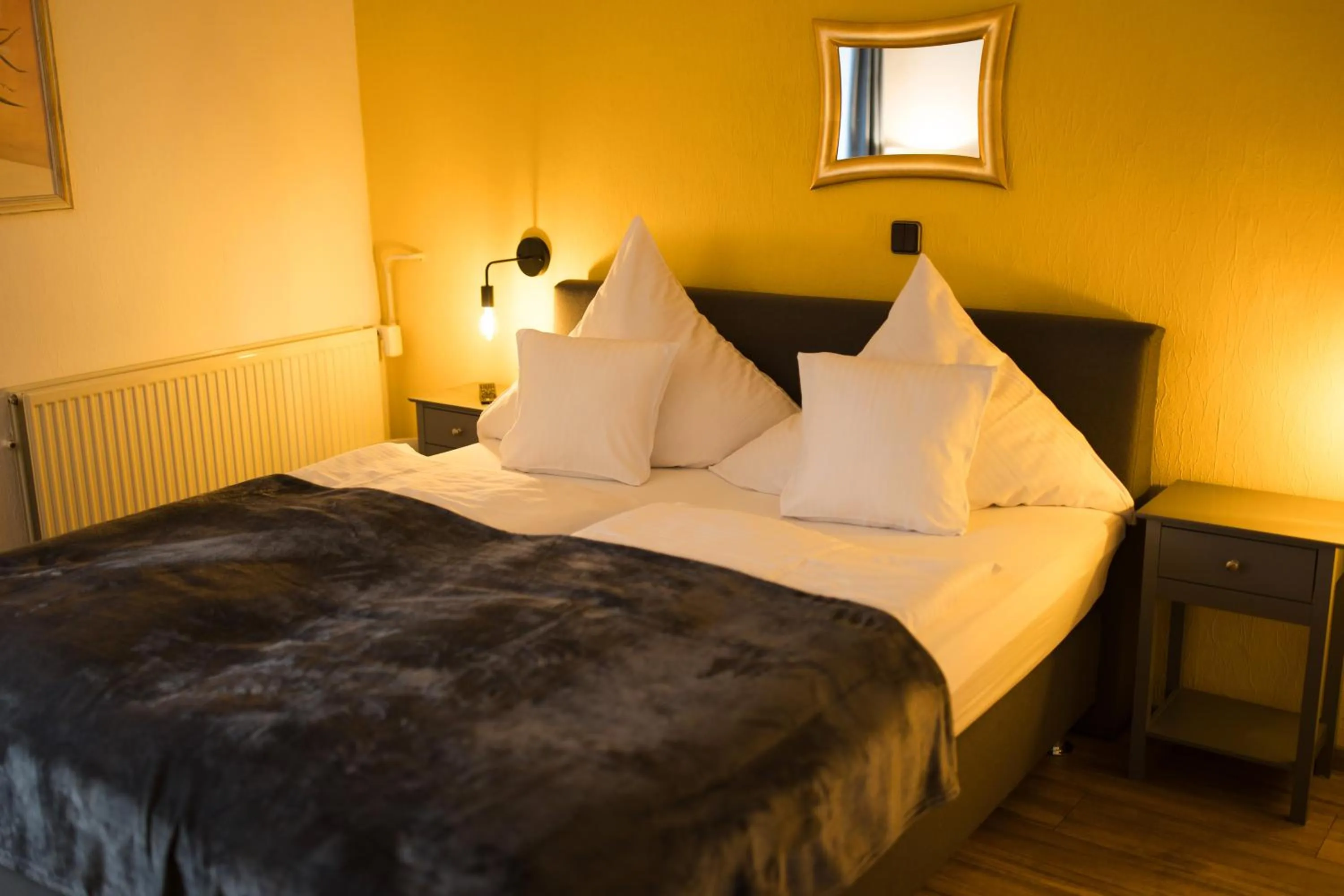 Bed in RATSKELLER Hotel & Restaurant