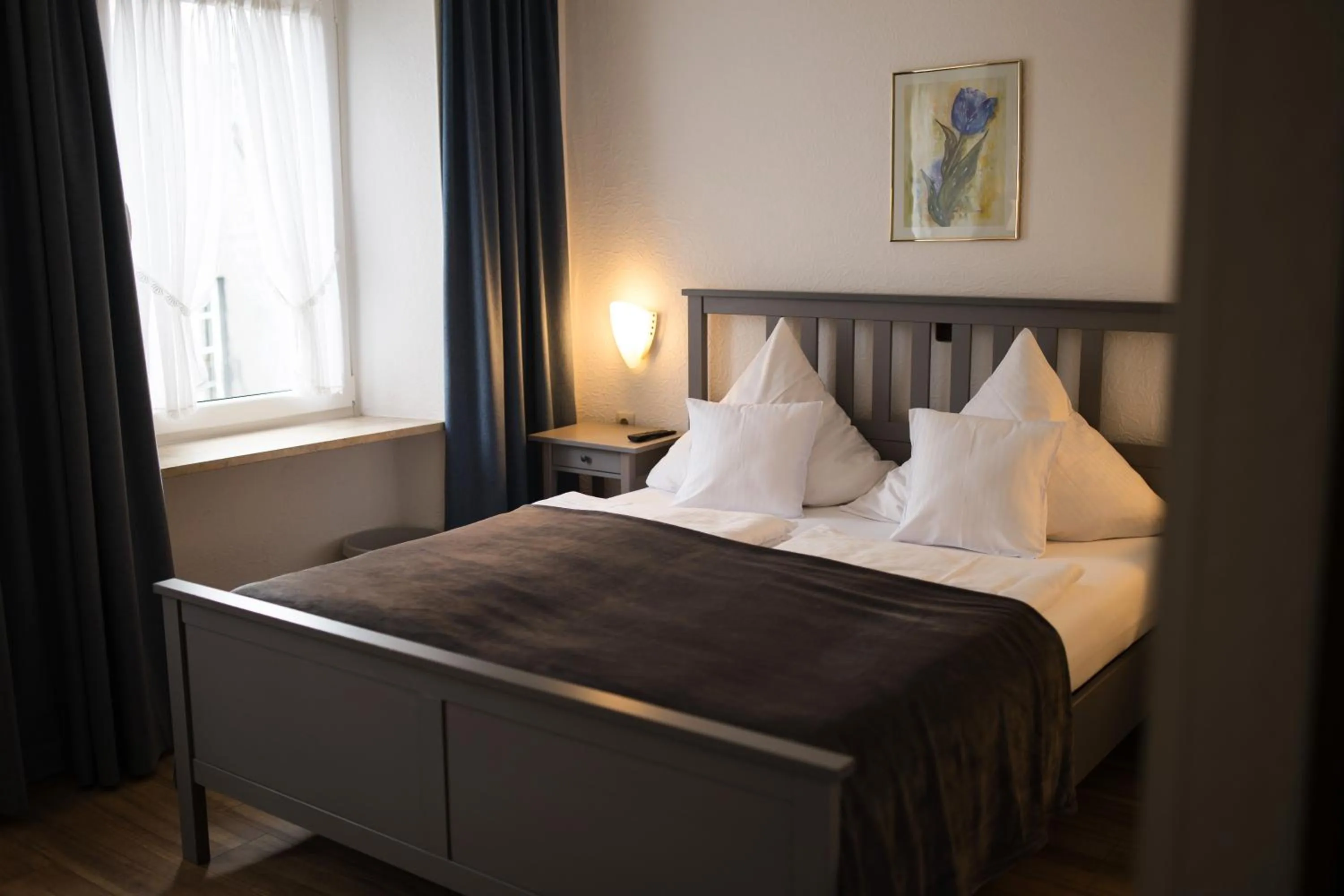 Bed in RATSKELLER Hotel & Restaurant