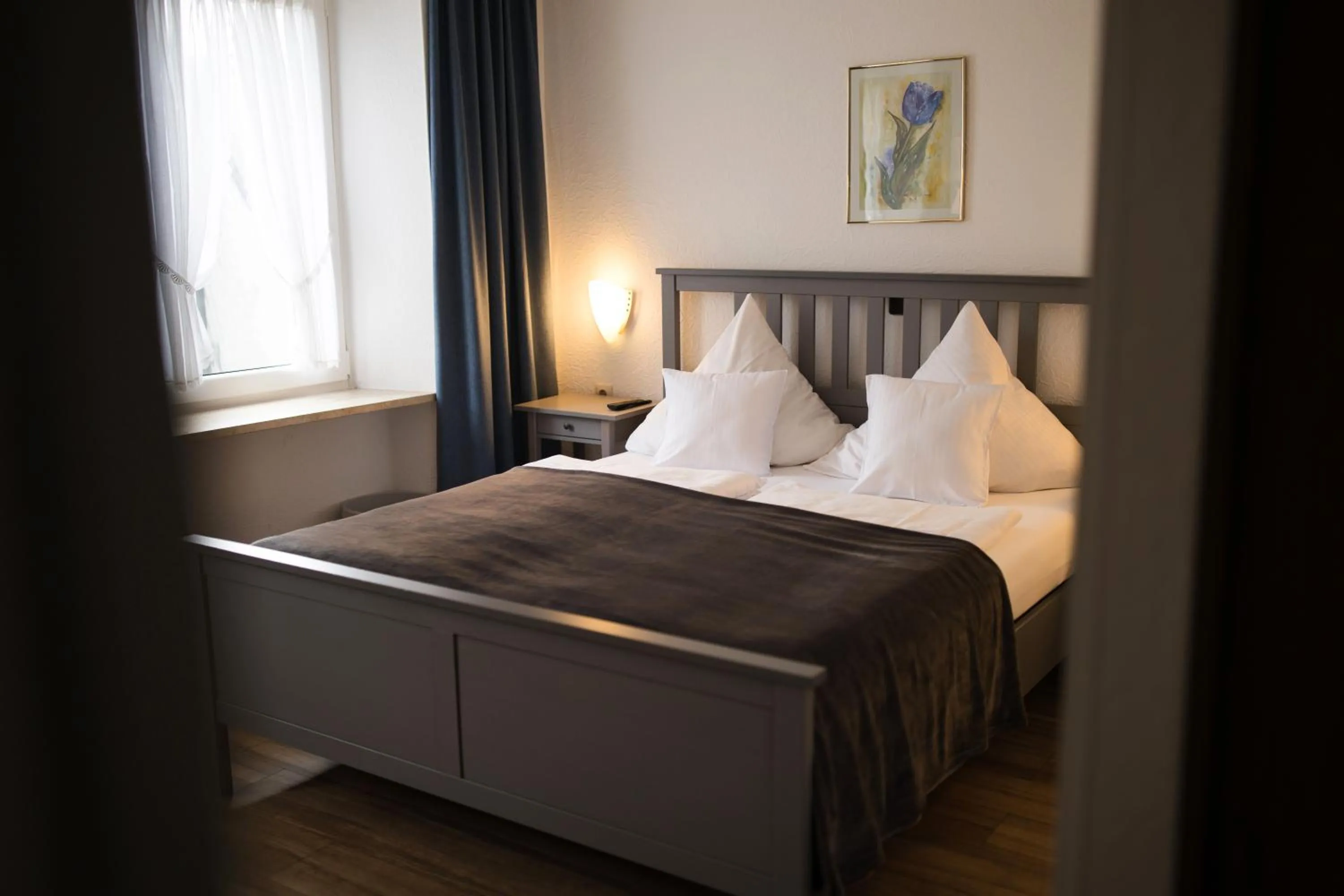 Bed in RATSKELLER Hotel & Restaurant