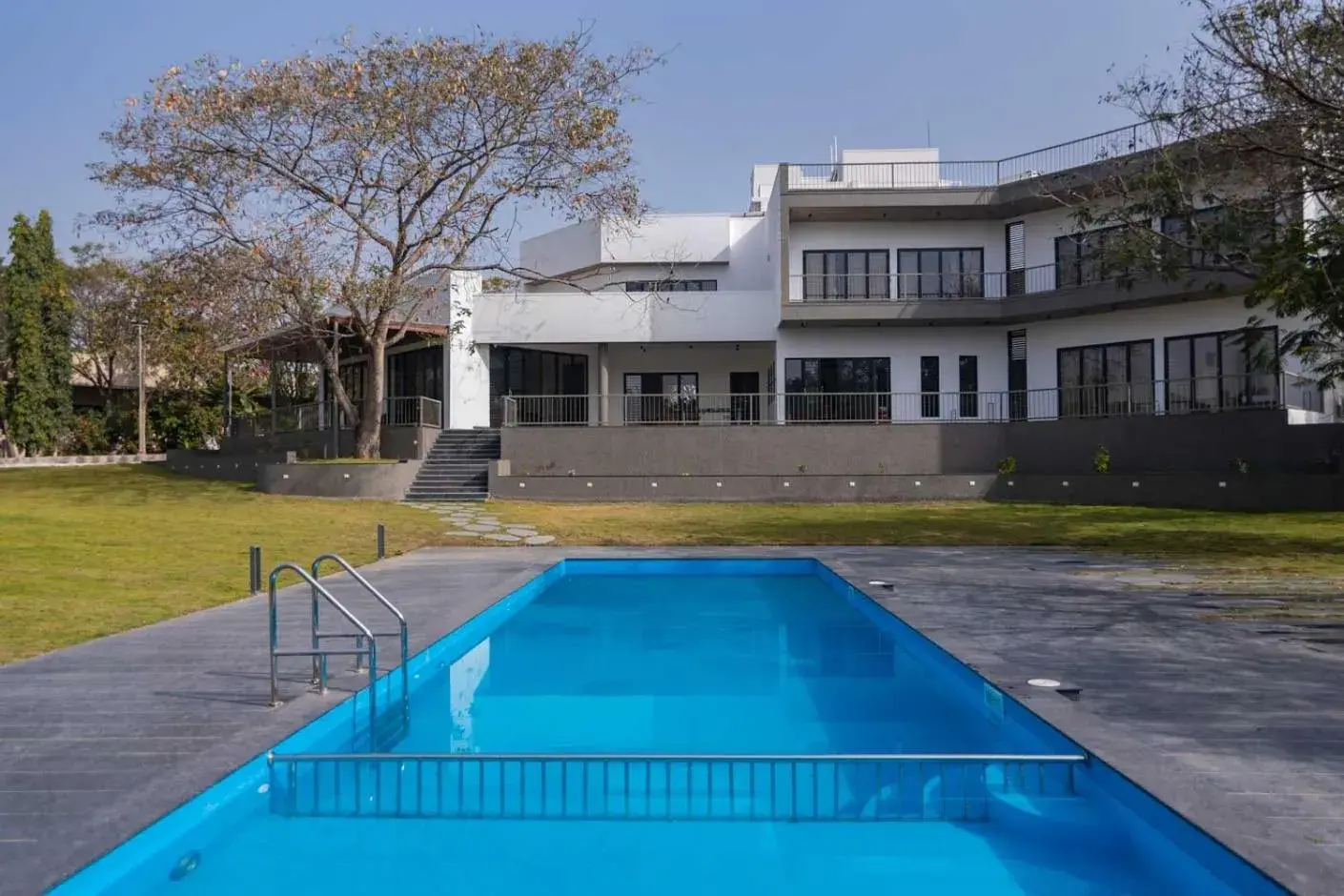 Villa in Earth Song by StayVista - Boasting an Open theatre, Games, Spacious lawn, Swimming pool & Conference room Villa in Earth Song by StayVista - Boasting an Open theatre, Games, Spacious lawn, Swimming pool & Conference room