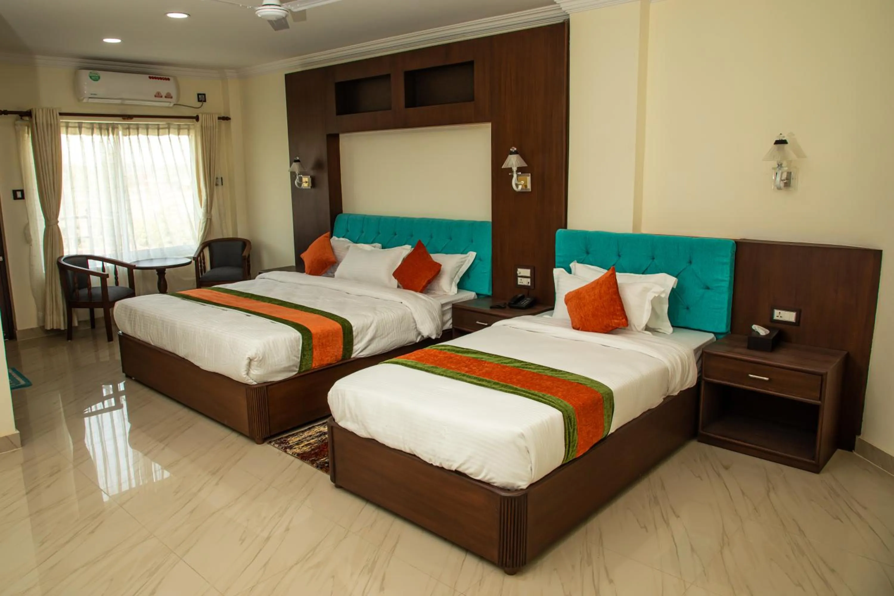Bed in Gautam Buddha International Hotel