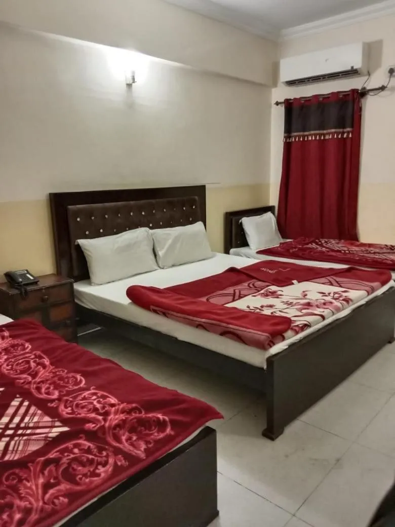 Bed in Hotel Khursheed Palace