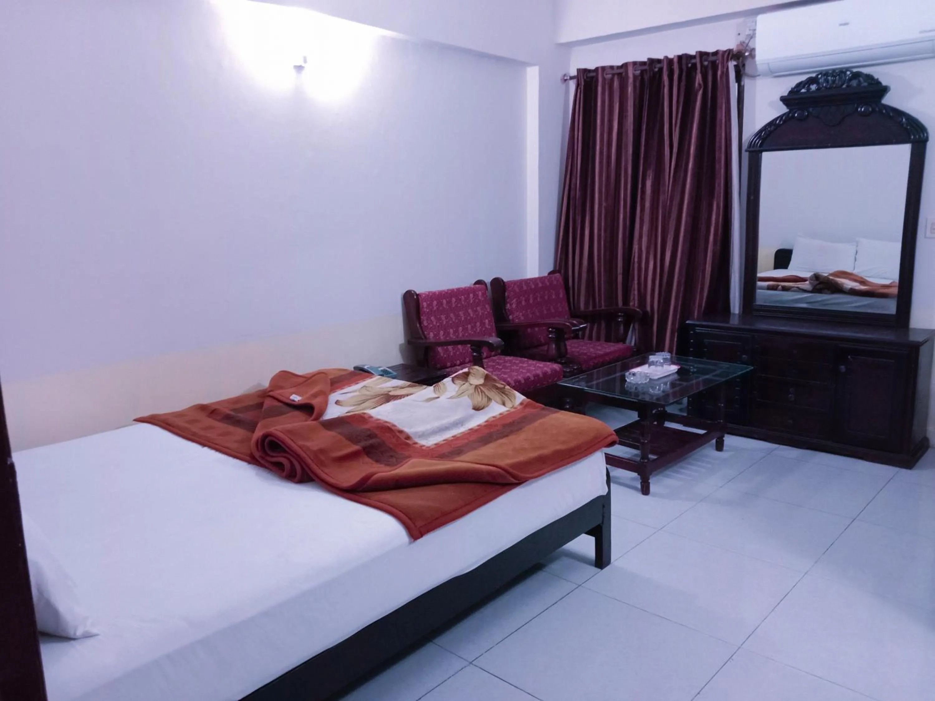 Bed in Hotel Khursheed Palace