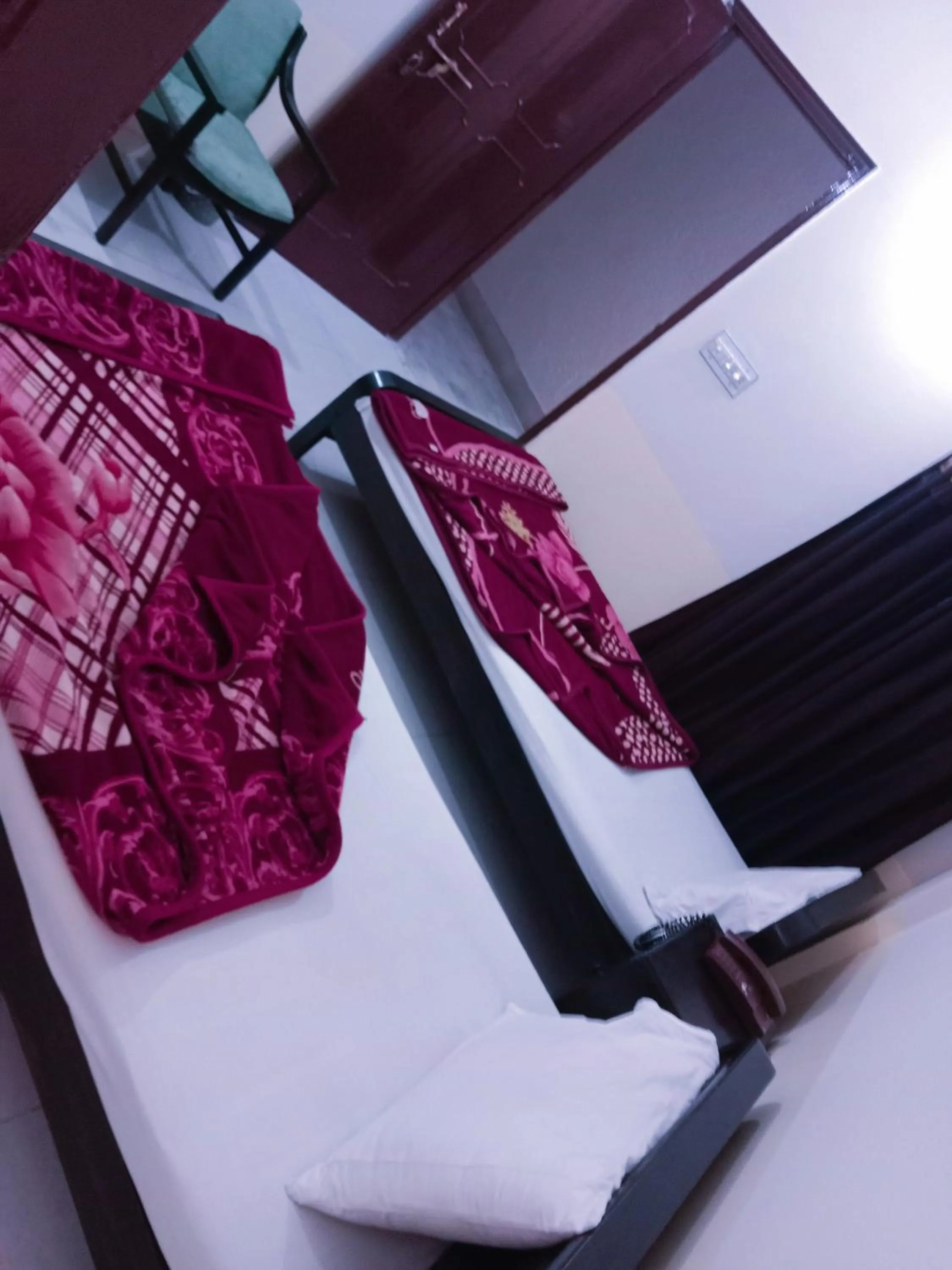 Bed in Hotel Khursheed Palace