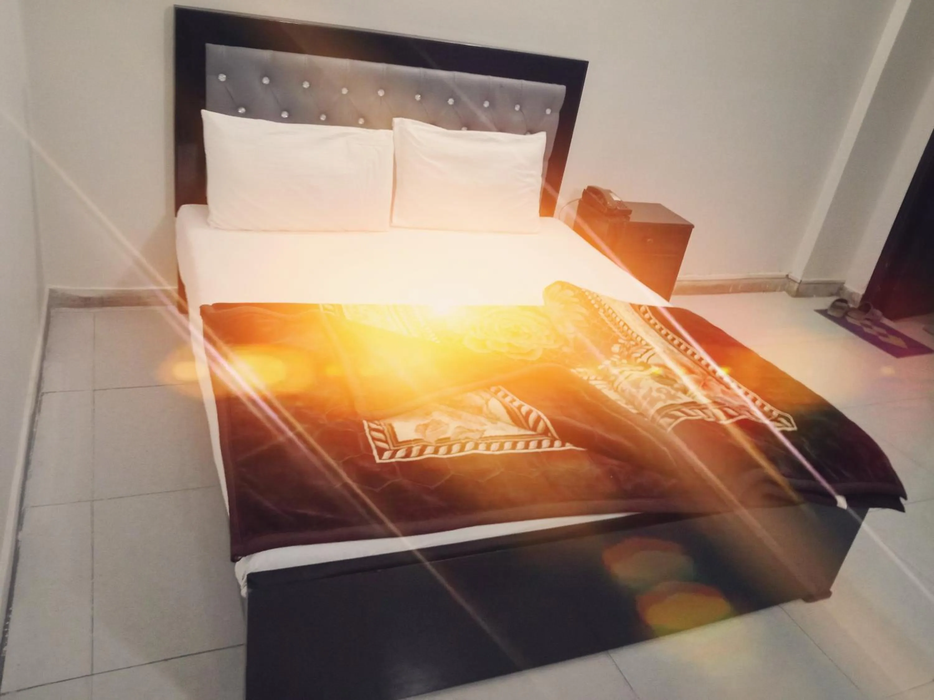 Bed in Hotel Khursheed Palace
