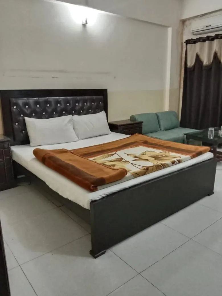 Bed in Hotel Khursheed Palace