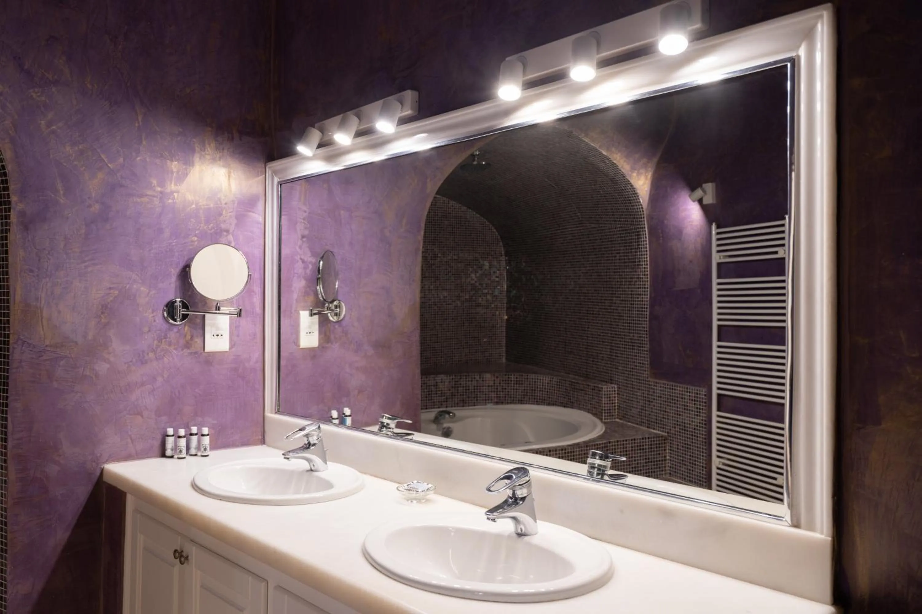 Bathroom in Asha Luxury Suites