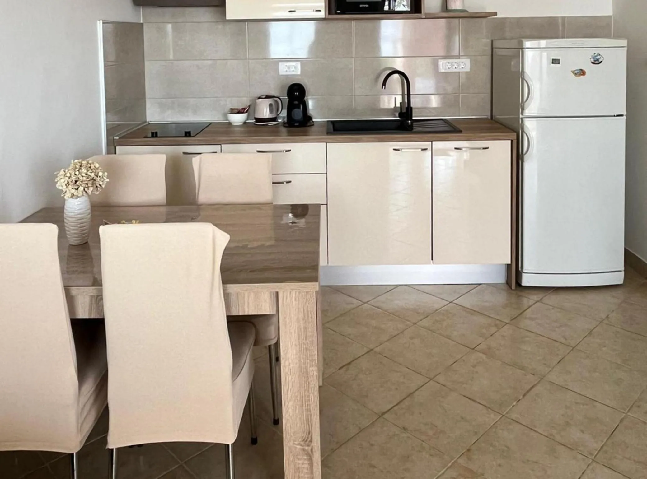 Kitchen or kitchenette in Apartments Dobrila