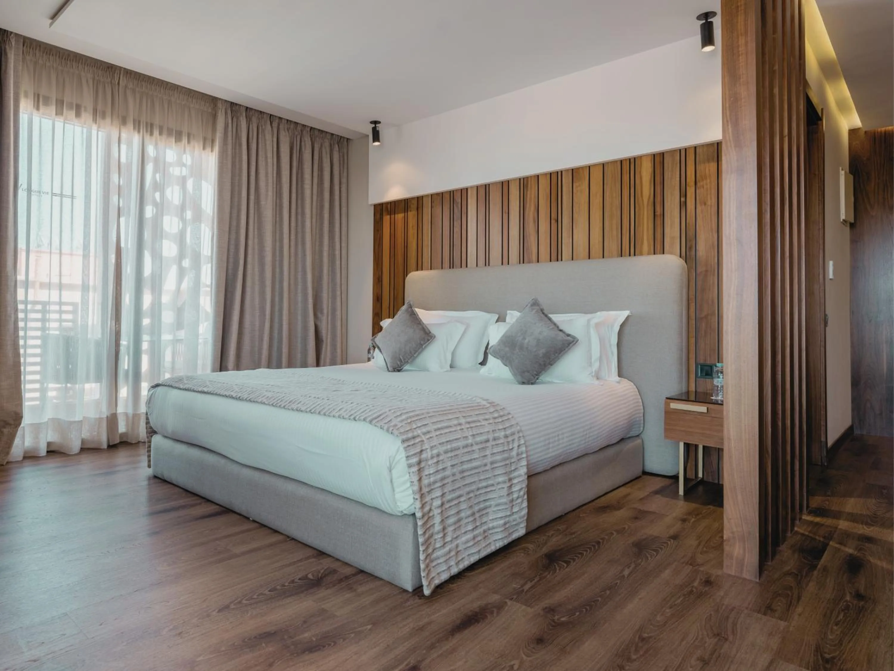 King Suite with Balcony in Longue vie Hotels