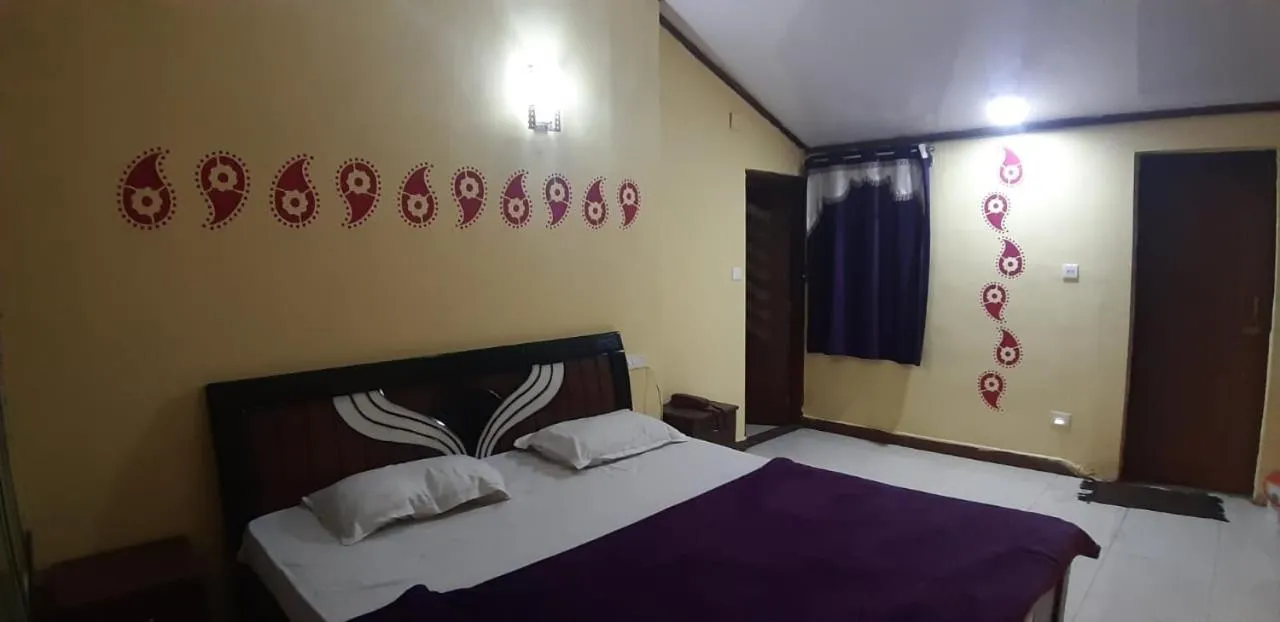 Bed in MAGIC MIST RESORT