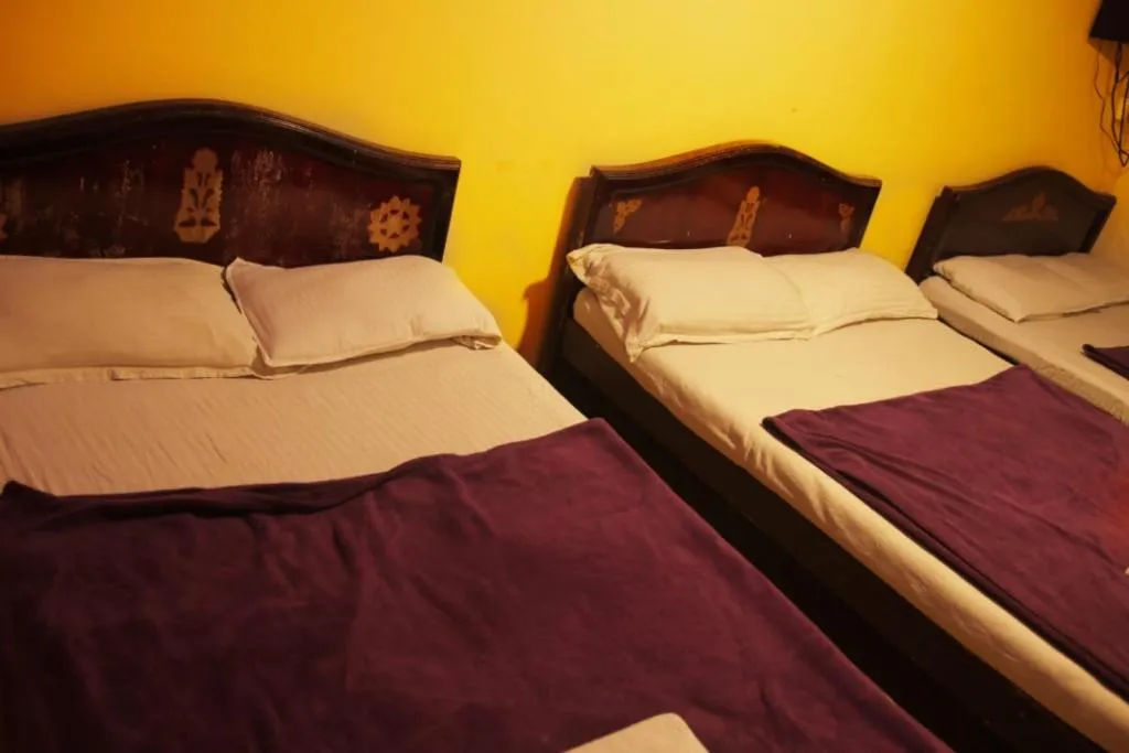 Bed in MAGIC MIST RESORT