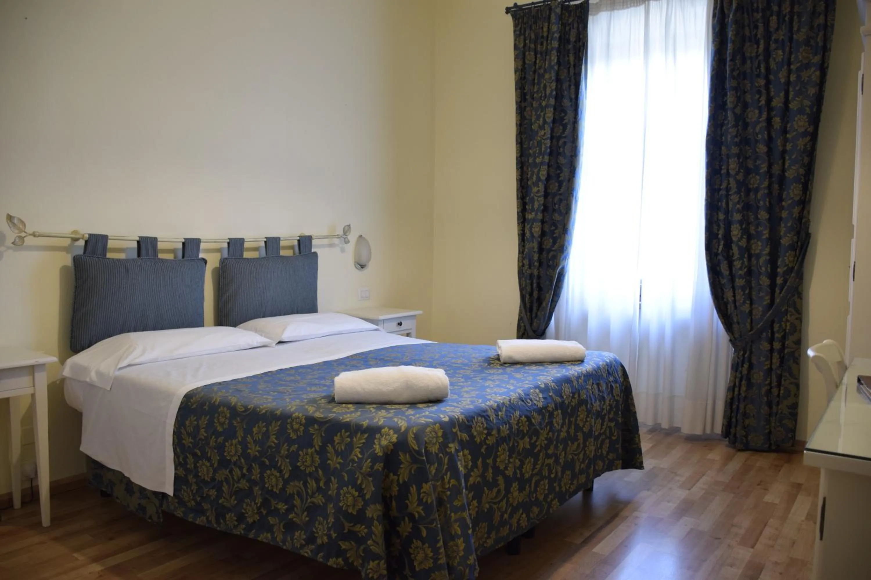 Bedroom in Hotel Arcobaleno Siena