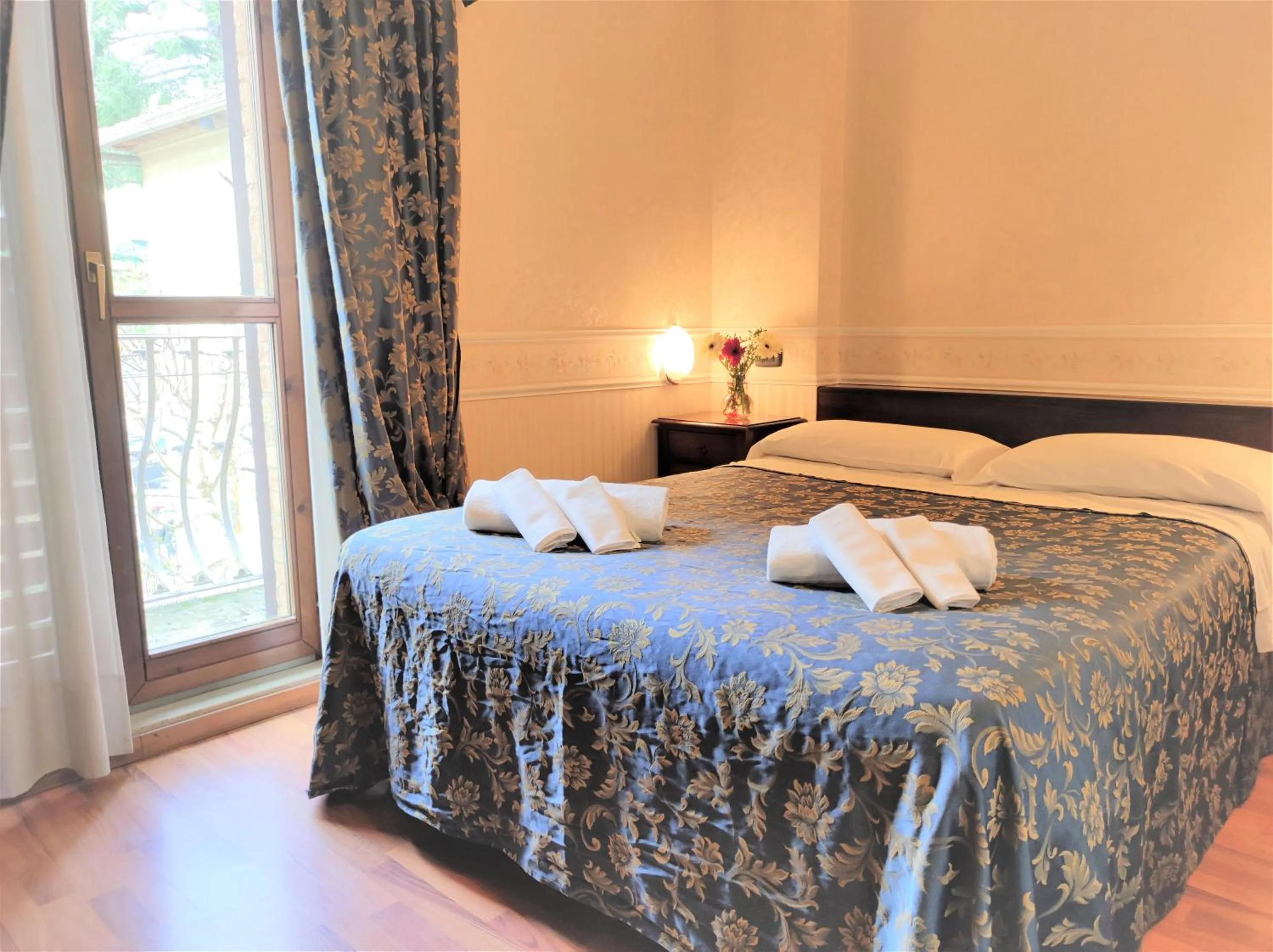 Bedroom in Hotel Arcobaleno Siena