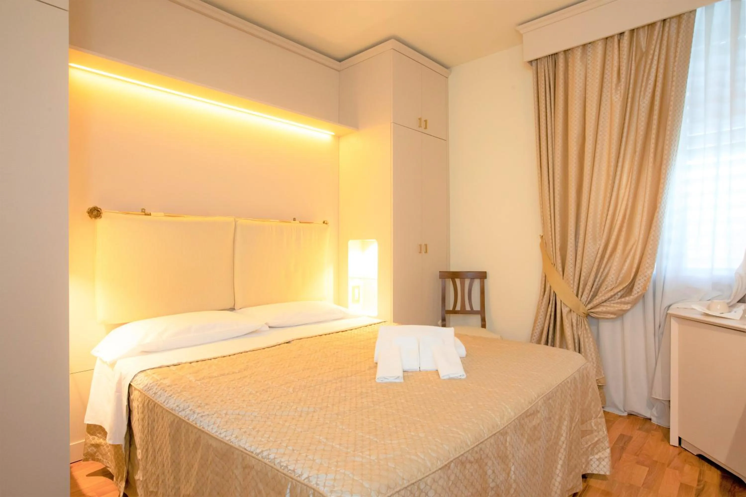 Bed in Hotel Arcobaleno Siena