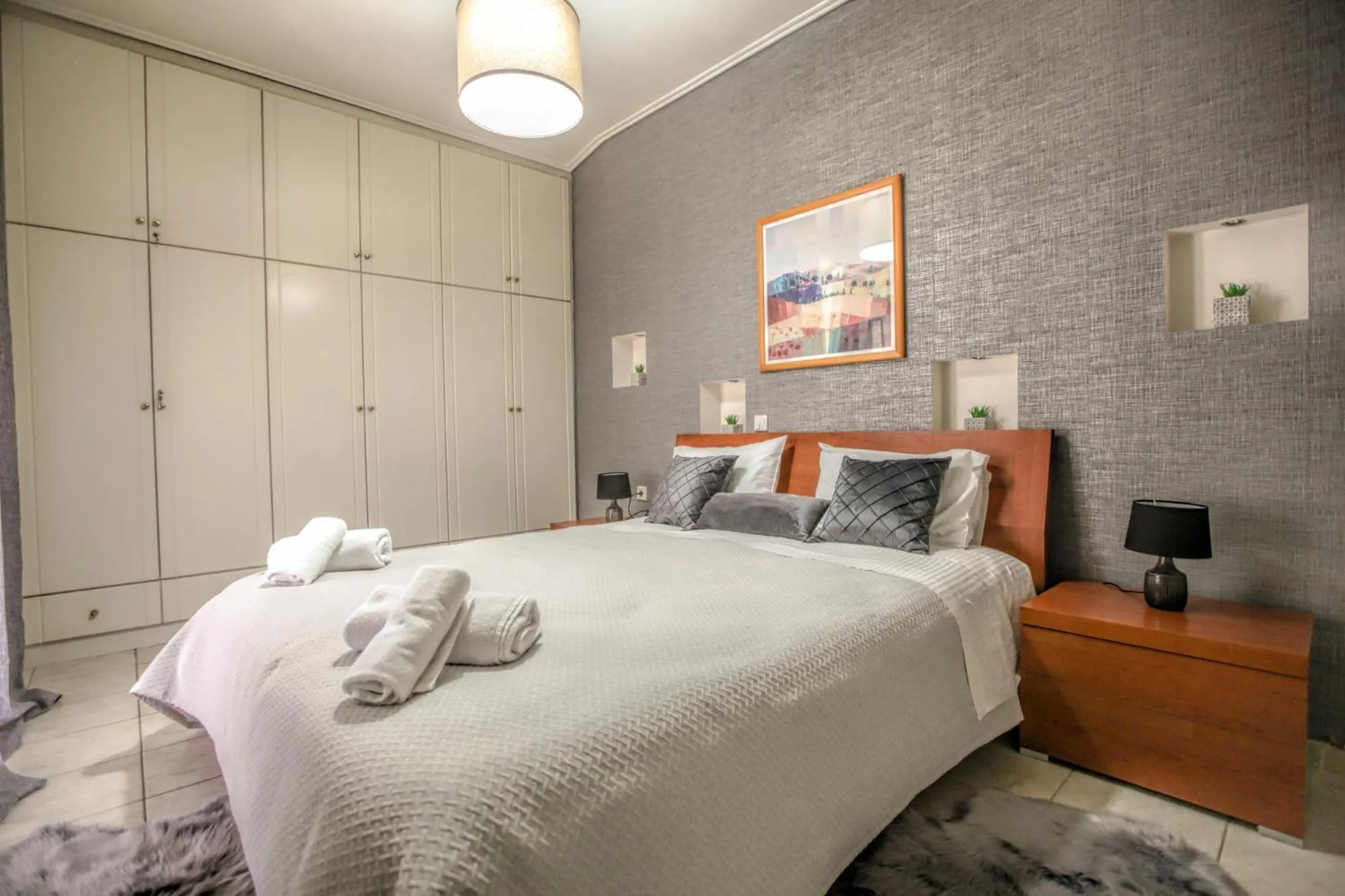 Bed in Grand Meteora Central Luxury Apartment