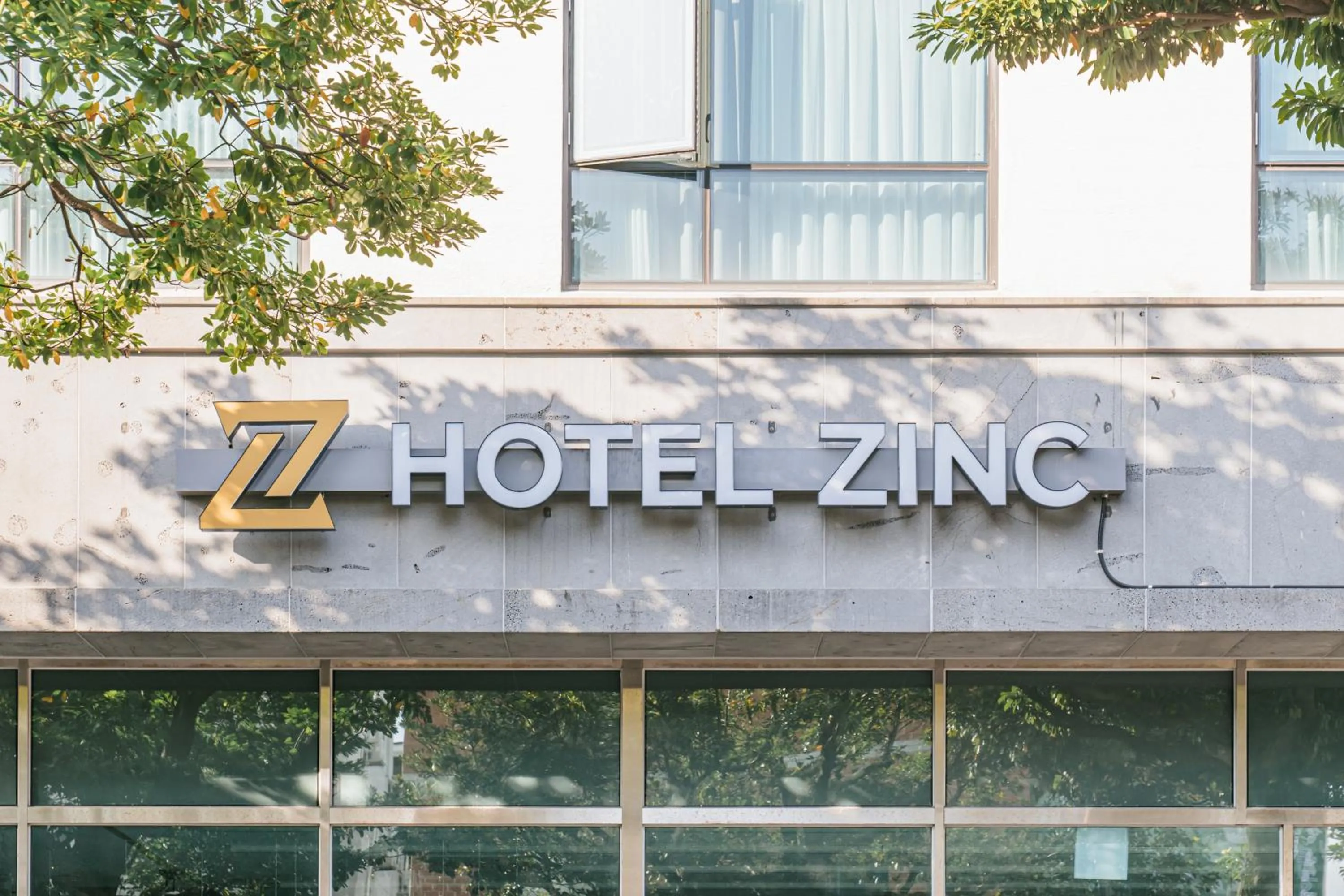 Property logo or sign in Hotel Zinc