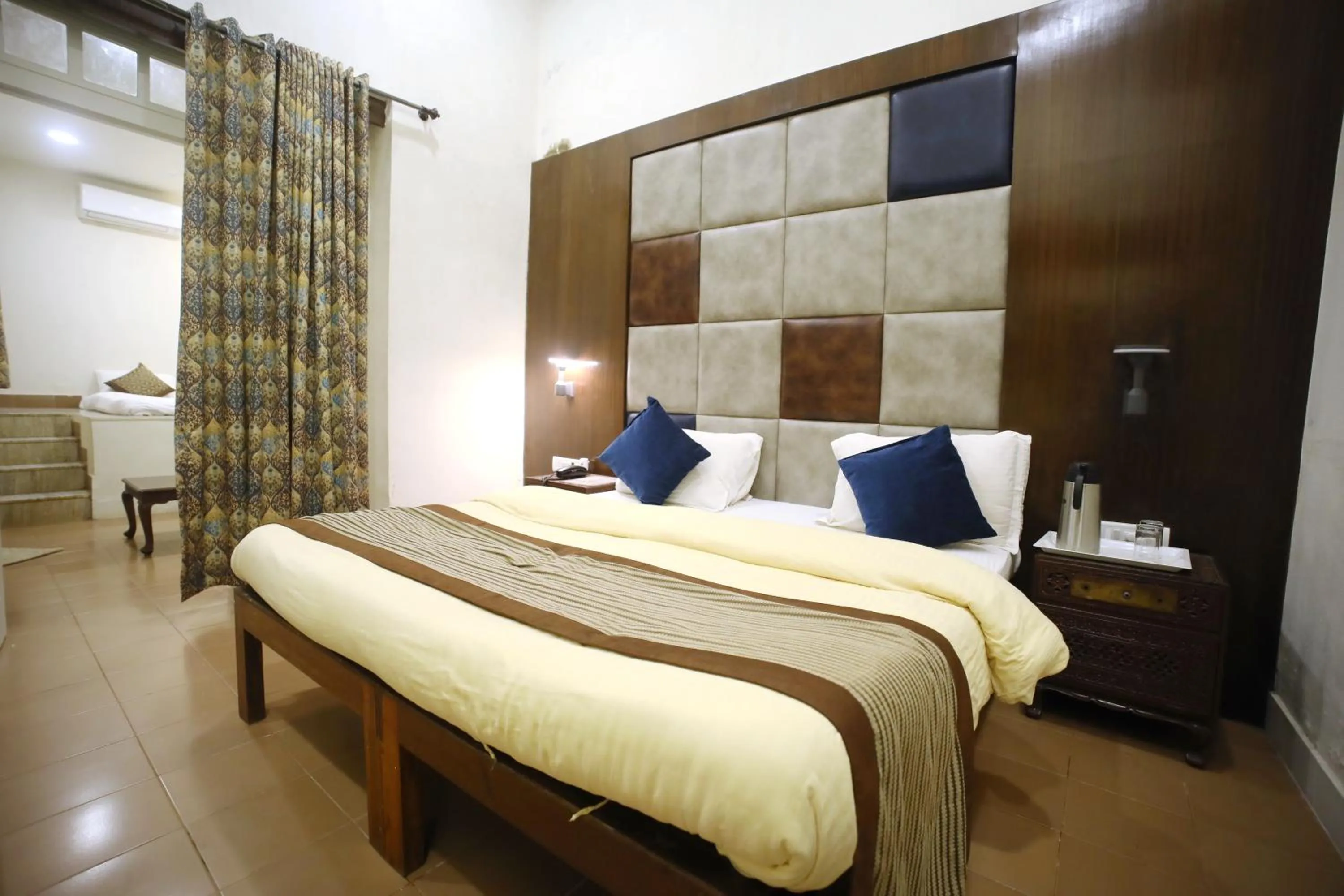 Bed in The Byke Heritage Resort - Matheran