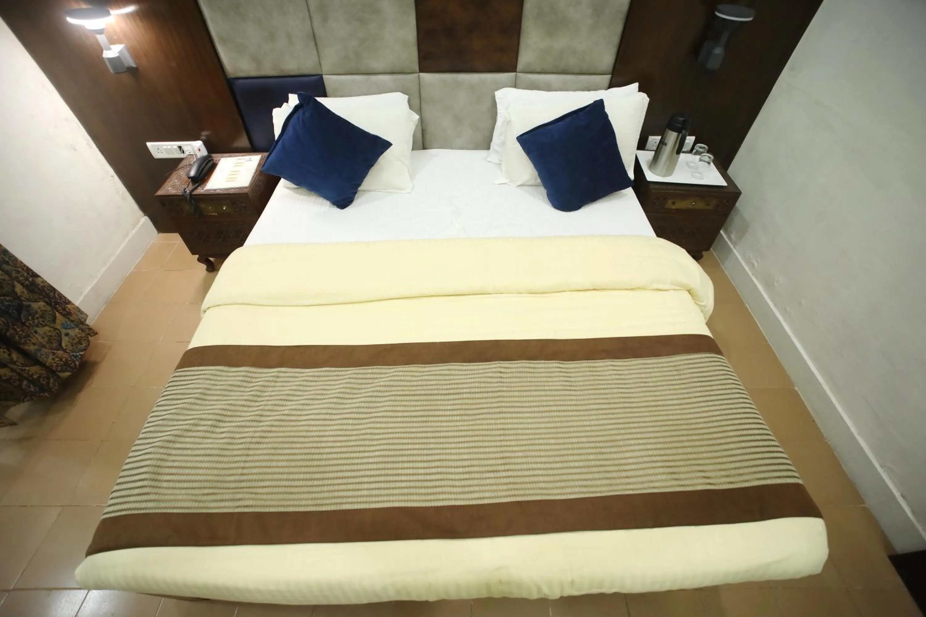 Bed in The Byke Heritage Resort - Matheran