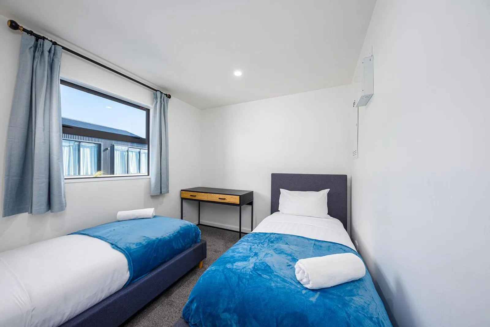 Bed in Tekapo Top 1000 Apartment