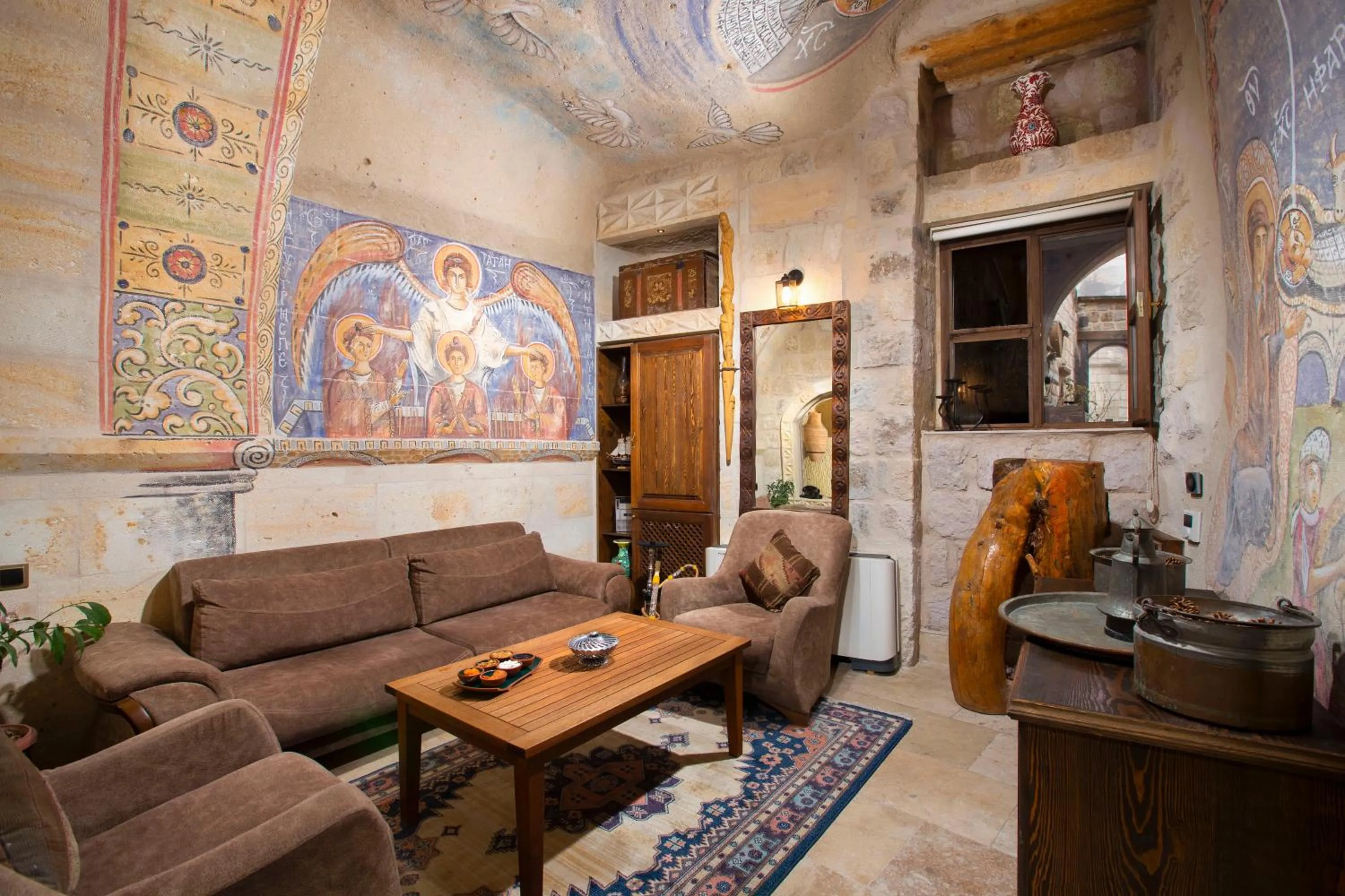 Seating area in Cappa Via Cave Hotel