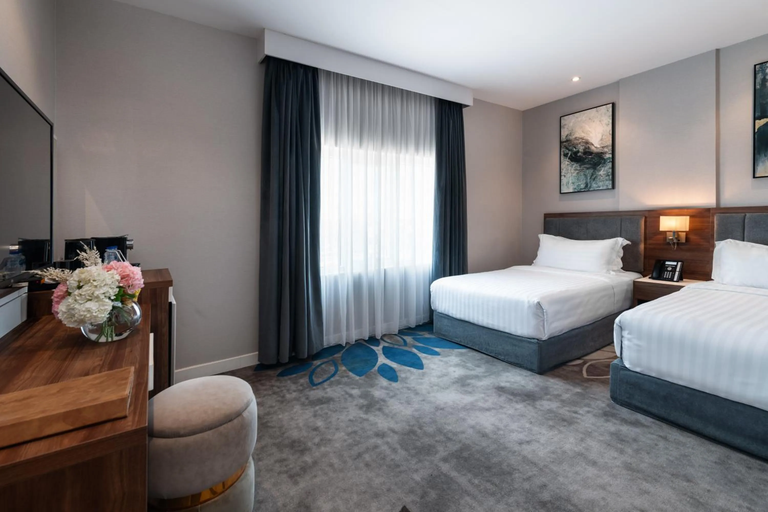 Bed in Warwick Al Jubail Hotel