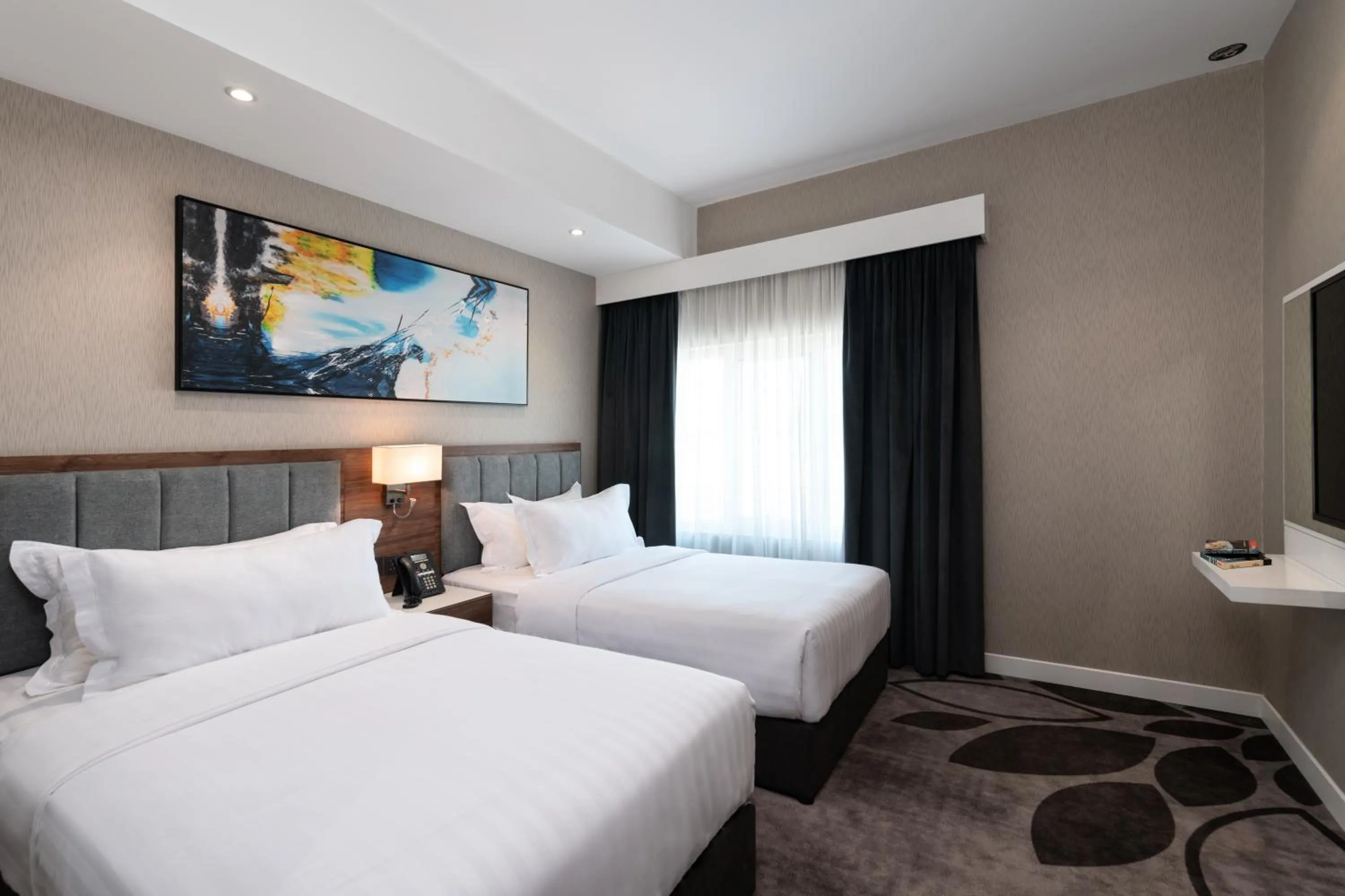 Bed in Warwick Al Jubail Hotel