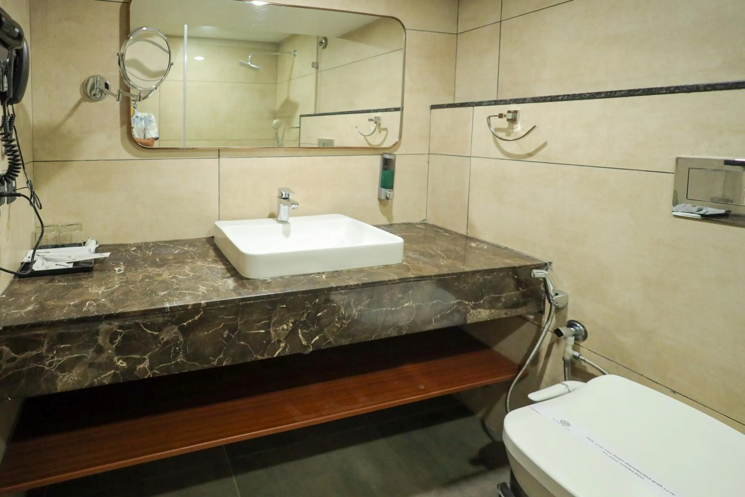 Bathroom in Royal Plaza Suites by RAK Rooms, Mangaluru