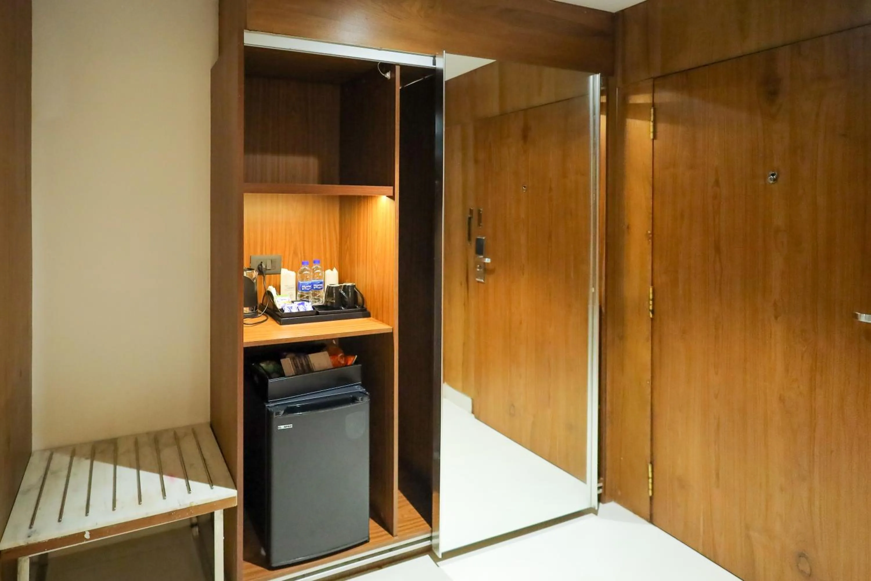 wardrobe in Royal Plaza Suites by RAK Rooms, Mangaluru