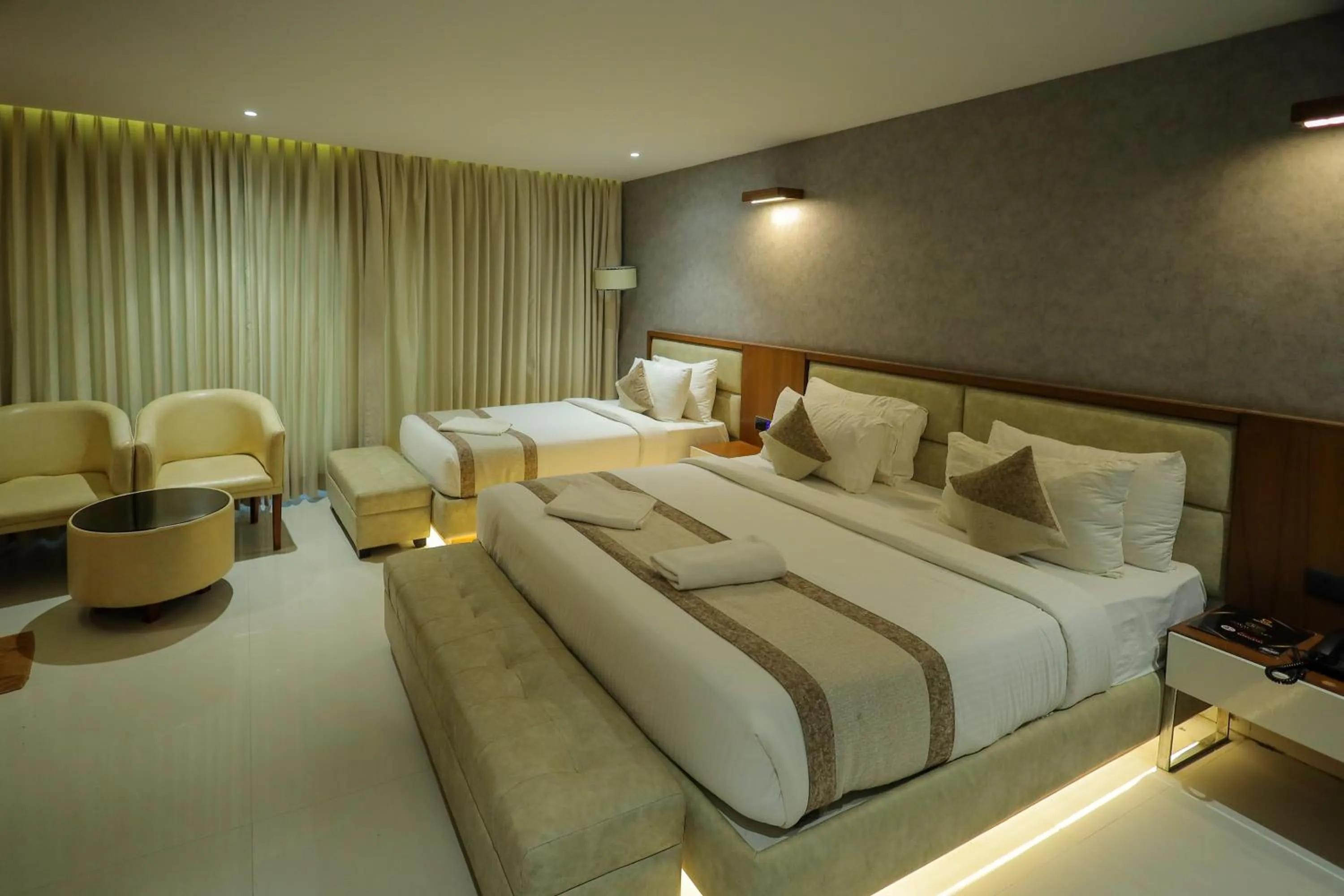 Bedroom, Bed in Royal Plaza Suites by RAK Rooms, Mangaluru