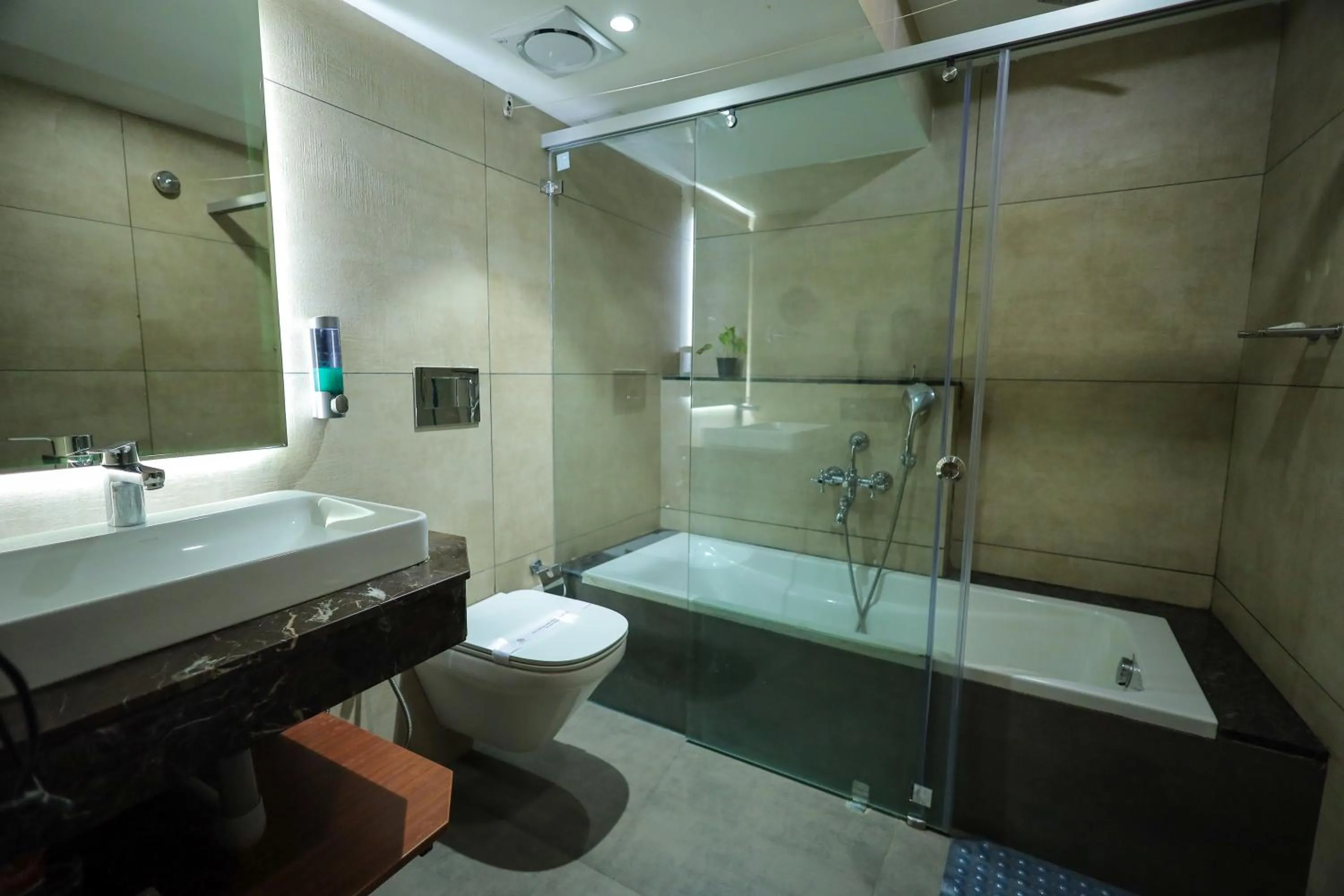 Bath in Royal Plaza Suites by RAK Rooms, Mangaluru