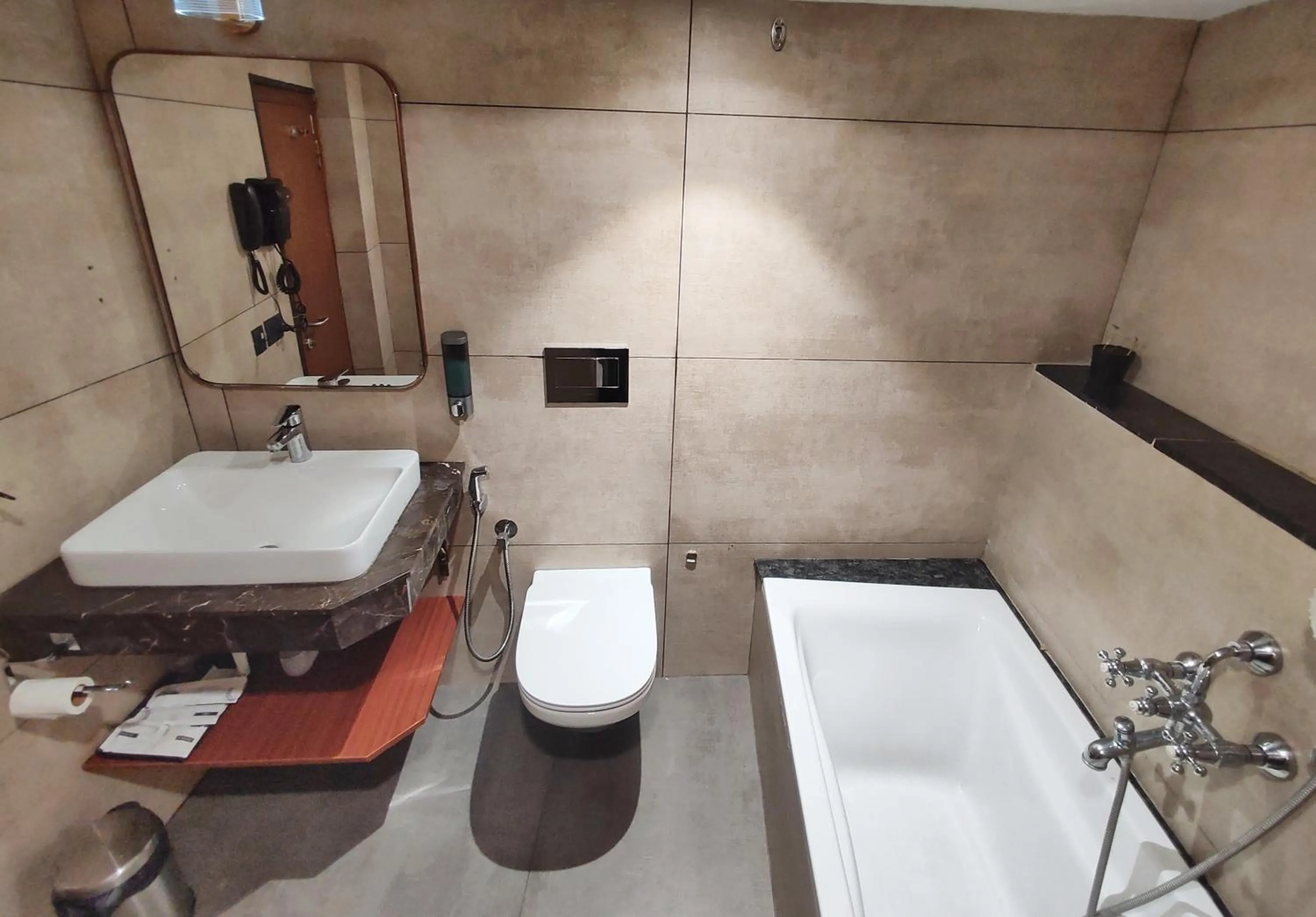 Bathroom in Royal Plaza Suites by RAK Rooms, Mangaluru