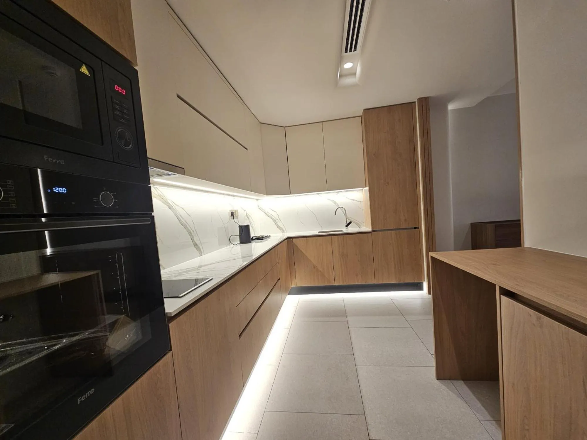 Kitchen or kitchenette in Al Faris Suites 2