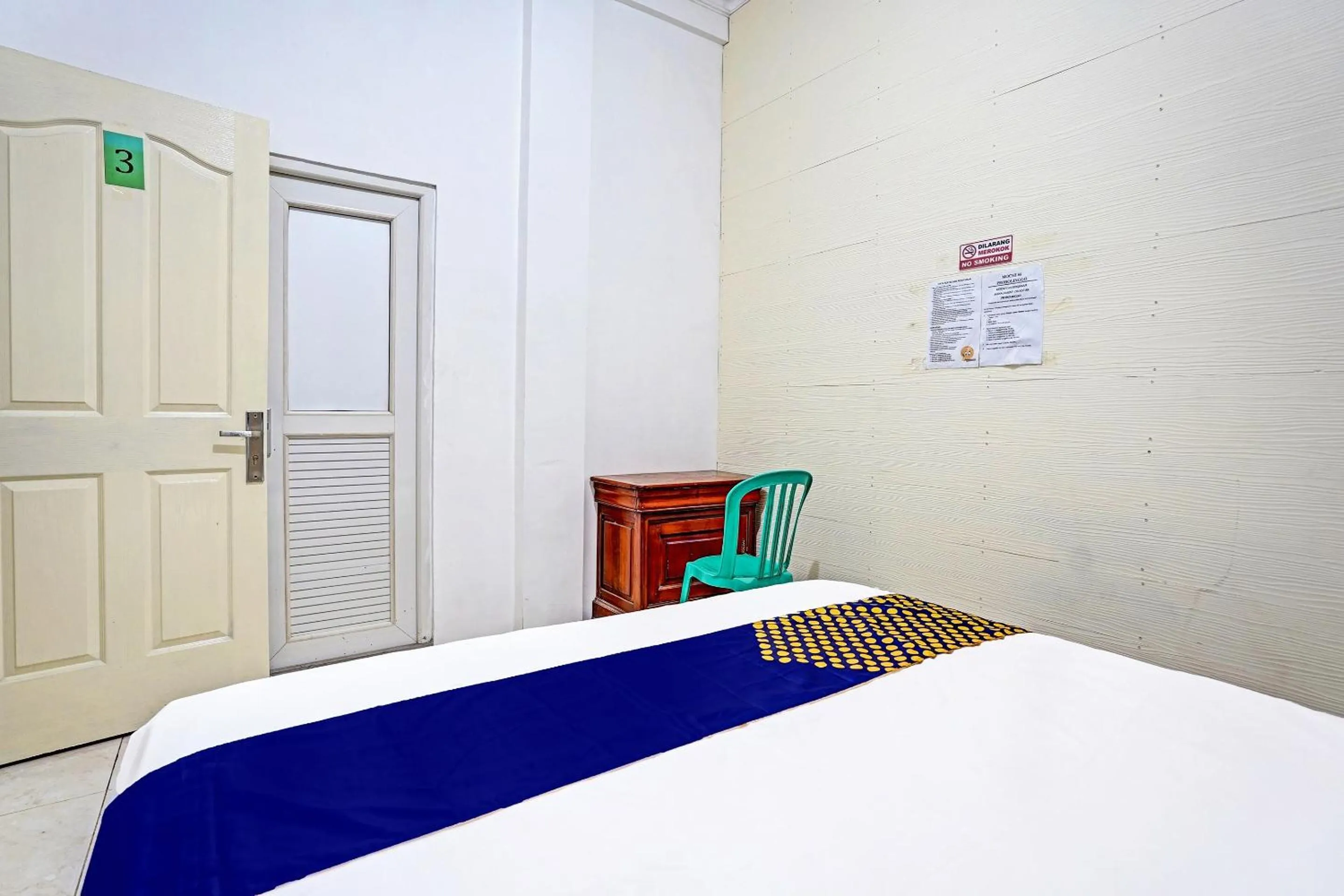 Bedroom in OYO 90943 Mochi 88 Homestay