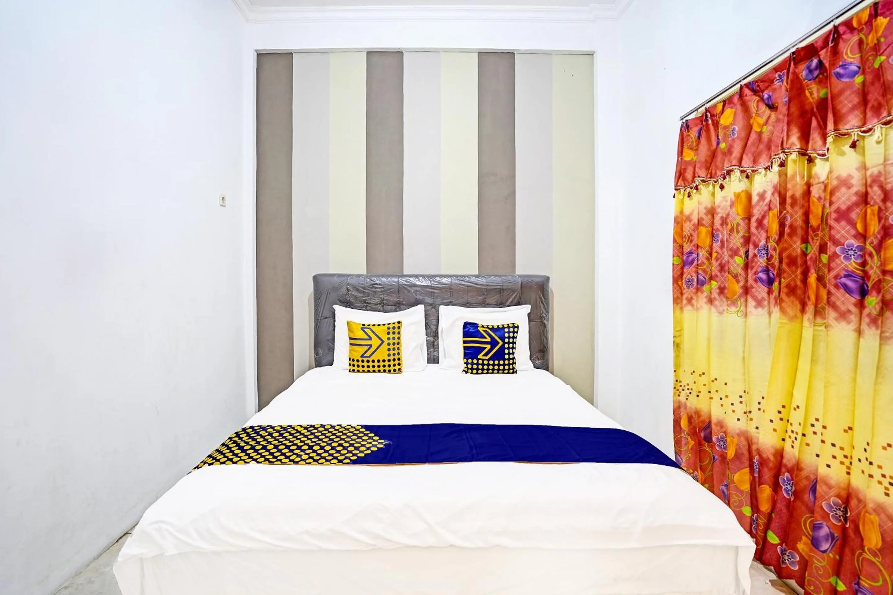 Bedroom in OYO 90943 Mochi 88 Homestay