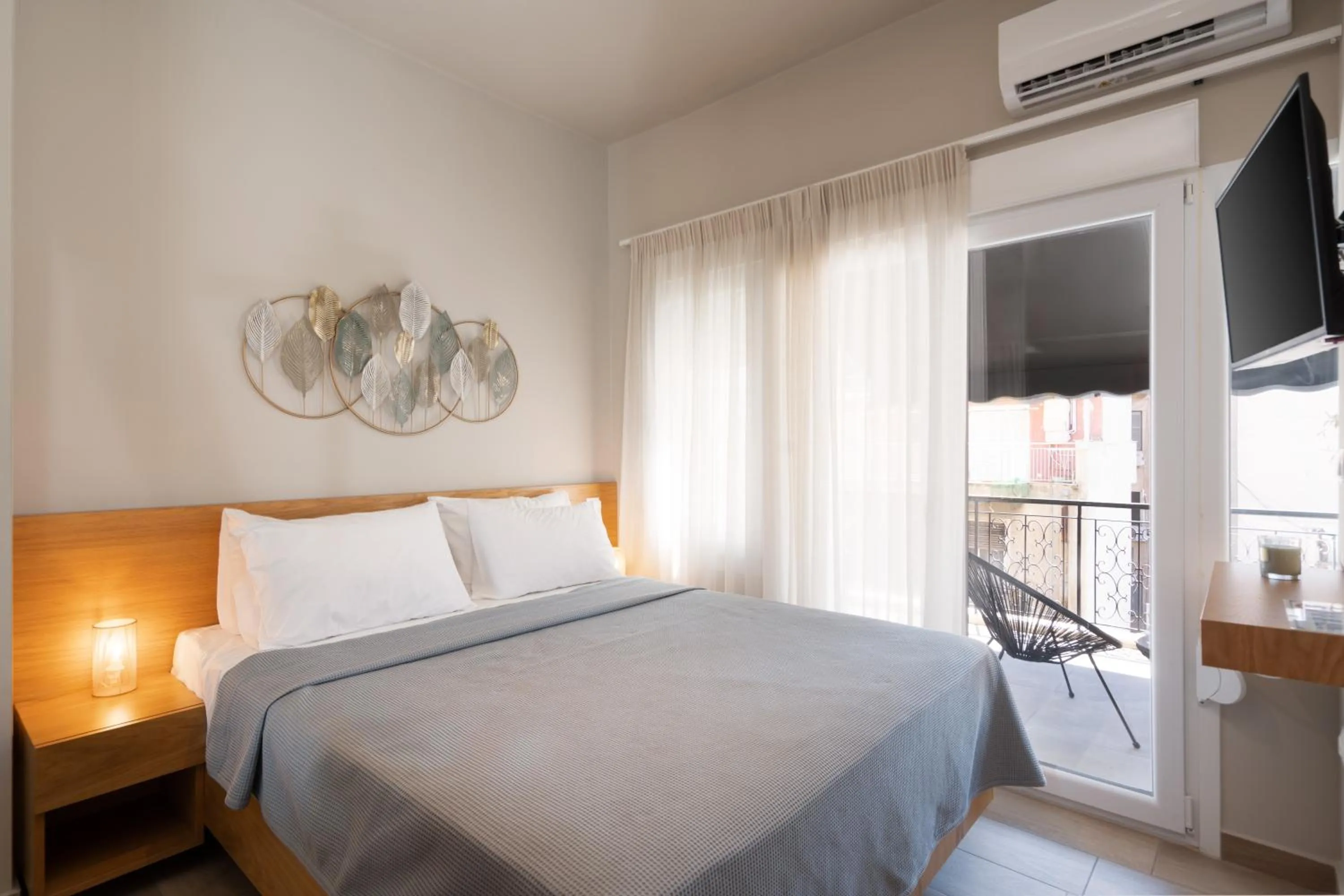 Bed in My Greek Vacations City Apartments