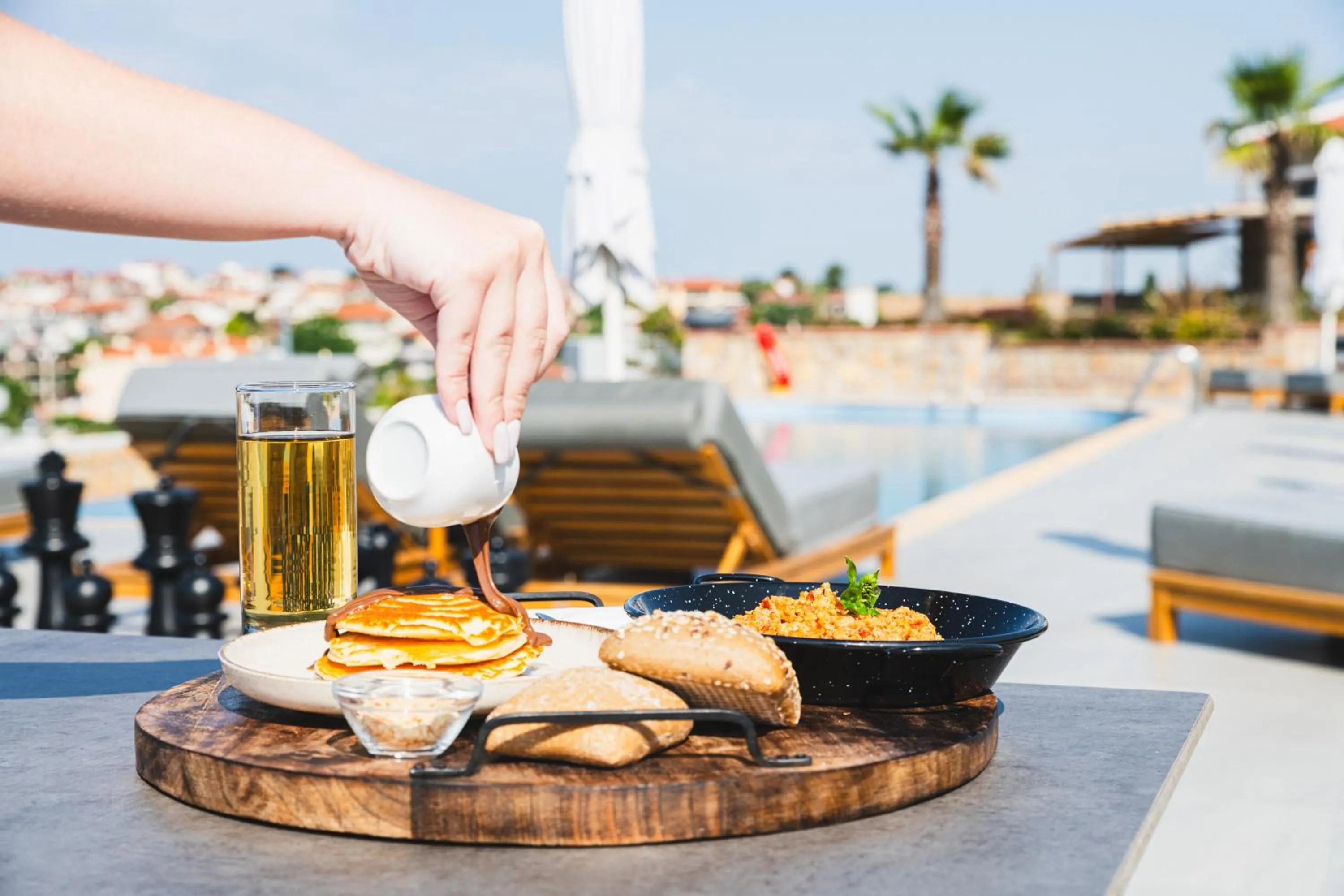 Swimming pool in Akrolithos Luxury Suites & Spa