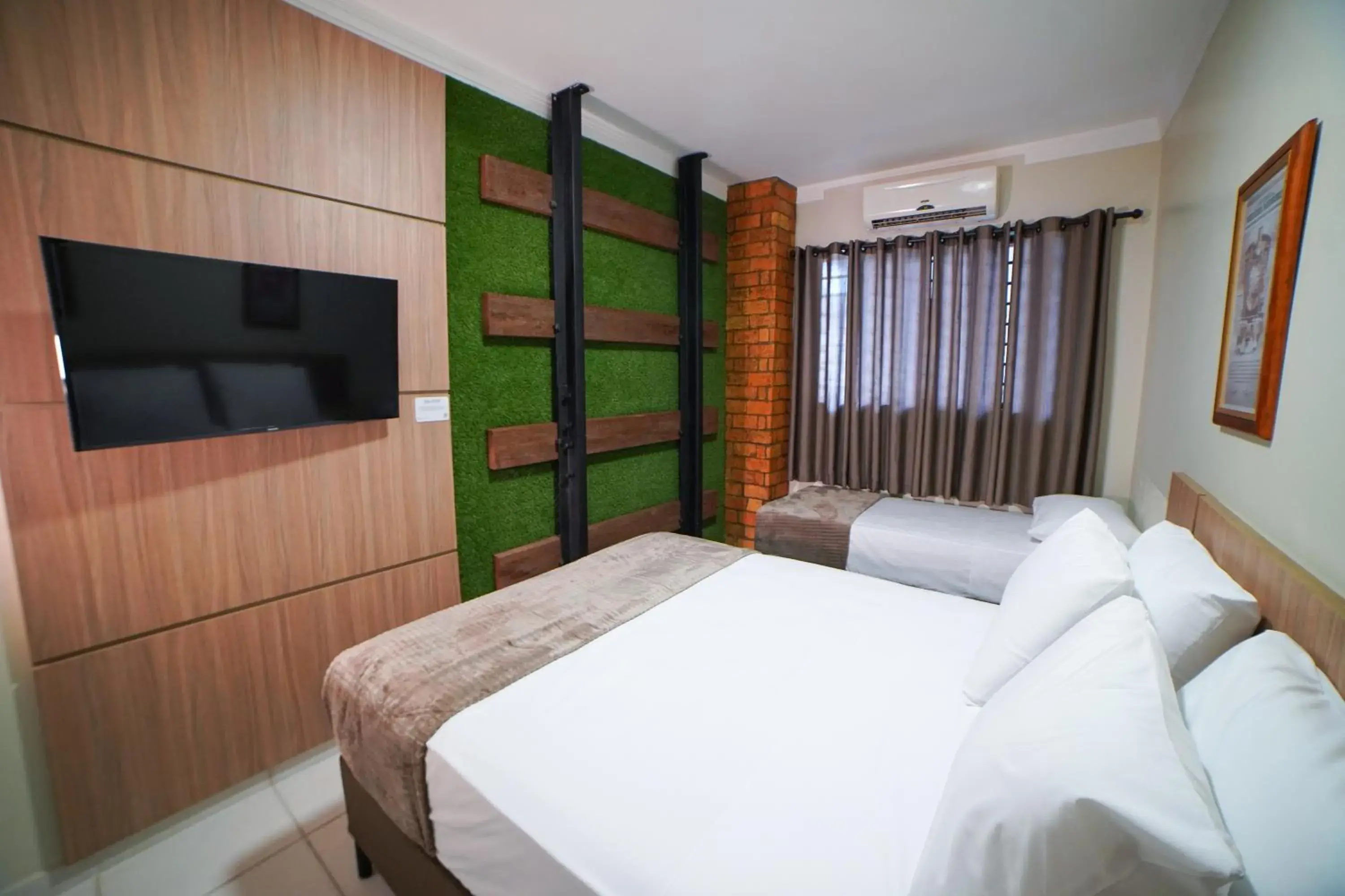 Comfort Quadruple Room - single occupancy in Pousada nossas Raízes Comfort Quadruple Room - single occupancy in Pousada nossas Raízes