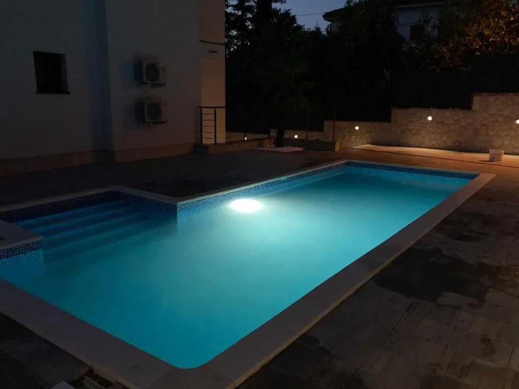 Swimming pool in Villa Njivice Apartment Ema