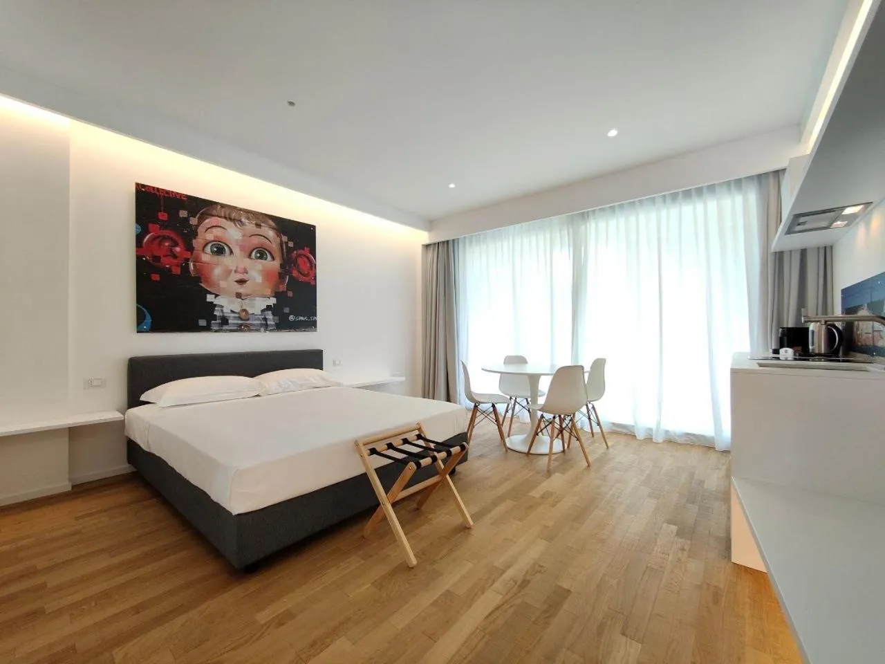 Kitchen or kitchenette, Bed in Marina Gardens Boutique&Suites