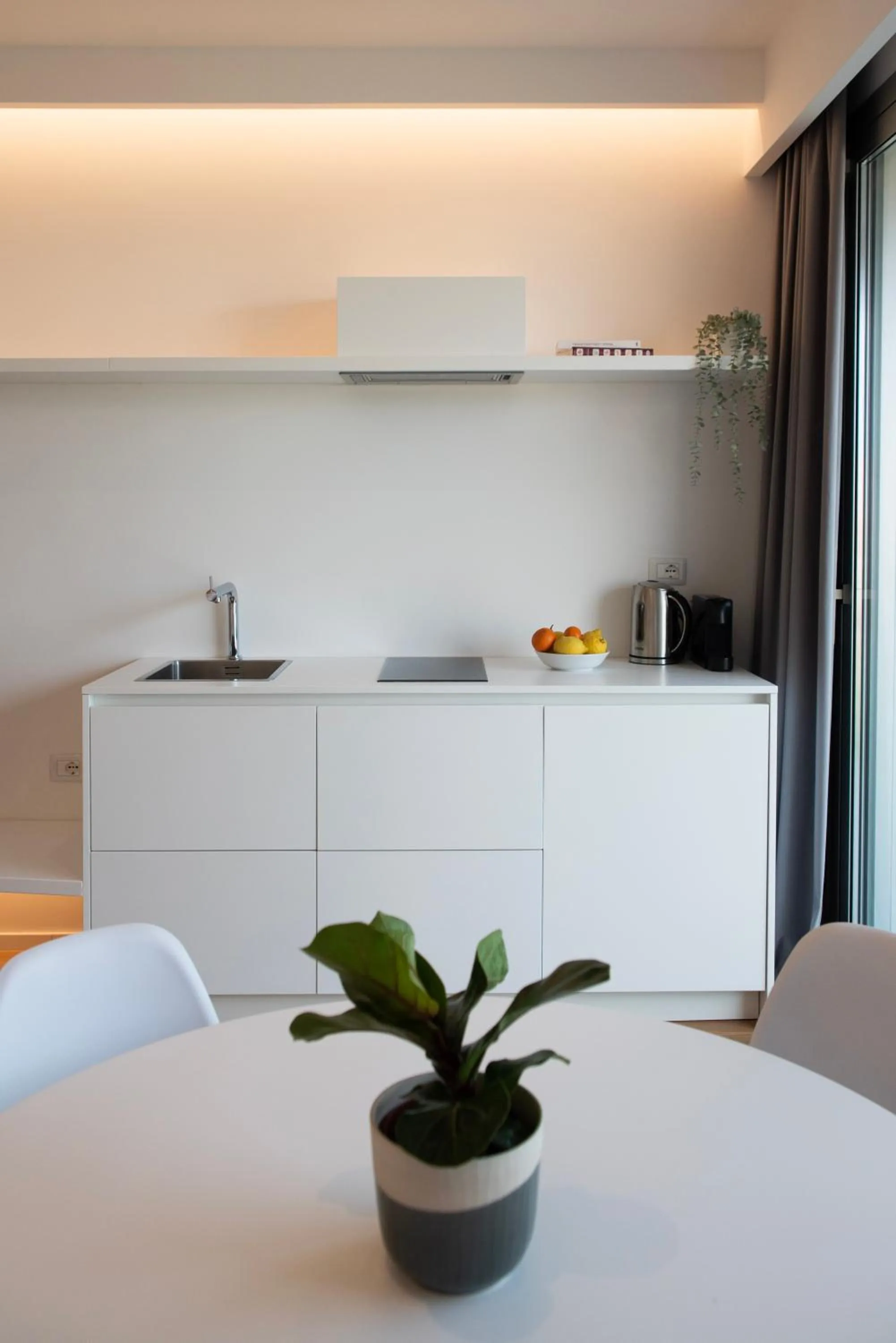 Kitchen or kitchenette in Marina Gardens Boutique&Suites