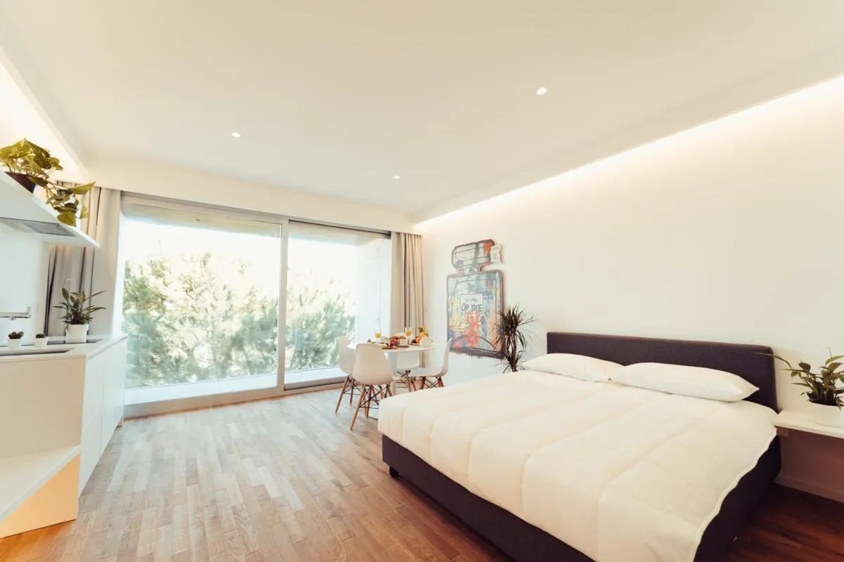 Bed in Marina Gardens Boutique&Suites