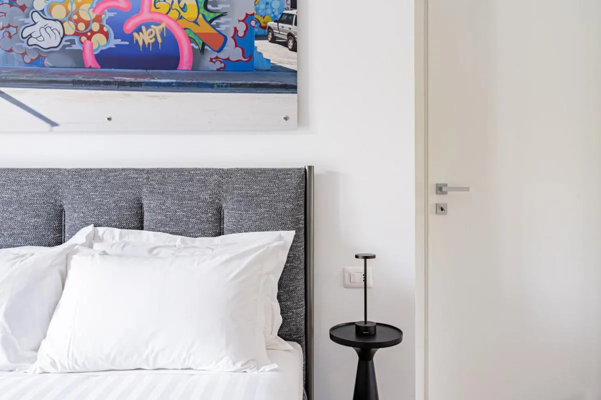 Bed in Marina Gardens Boutique&Suites